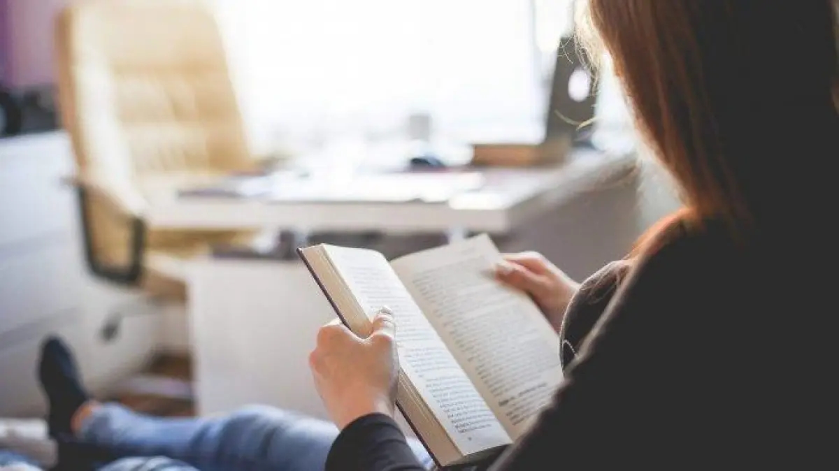 Person reading at home