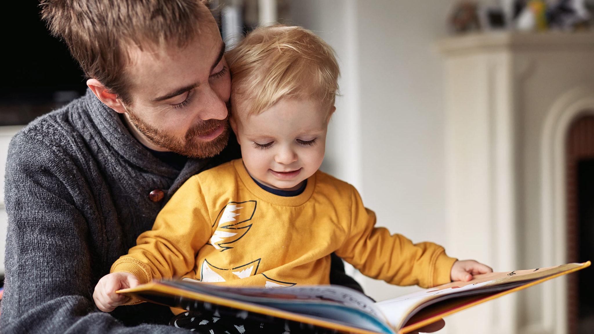 Dad and child reading