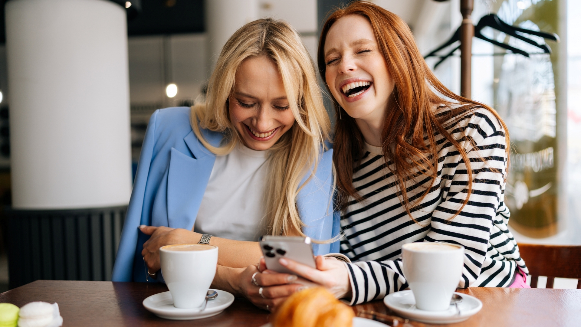 Friends talking at cafe