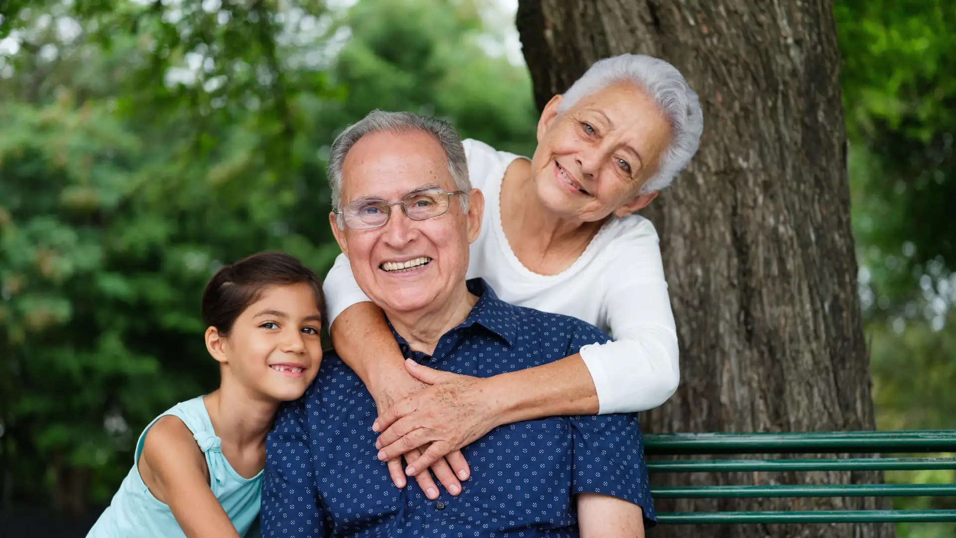 Happy grandparents with grandchild