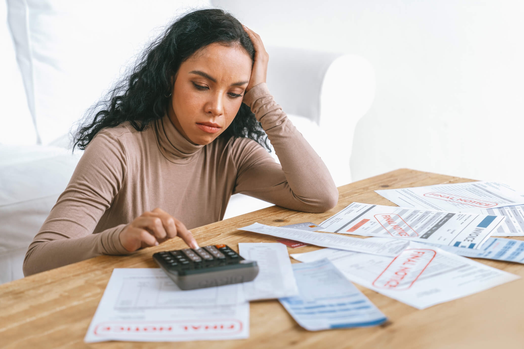 Person looking at bills