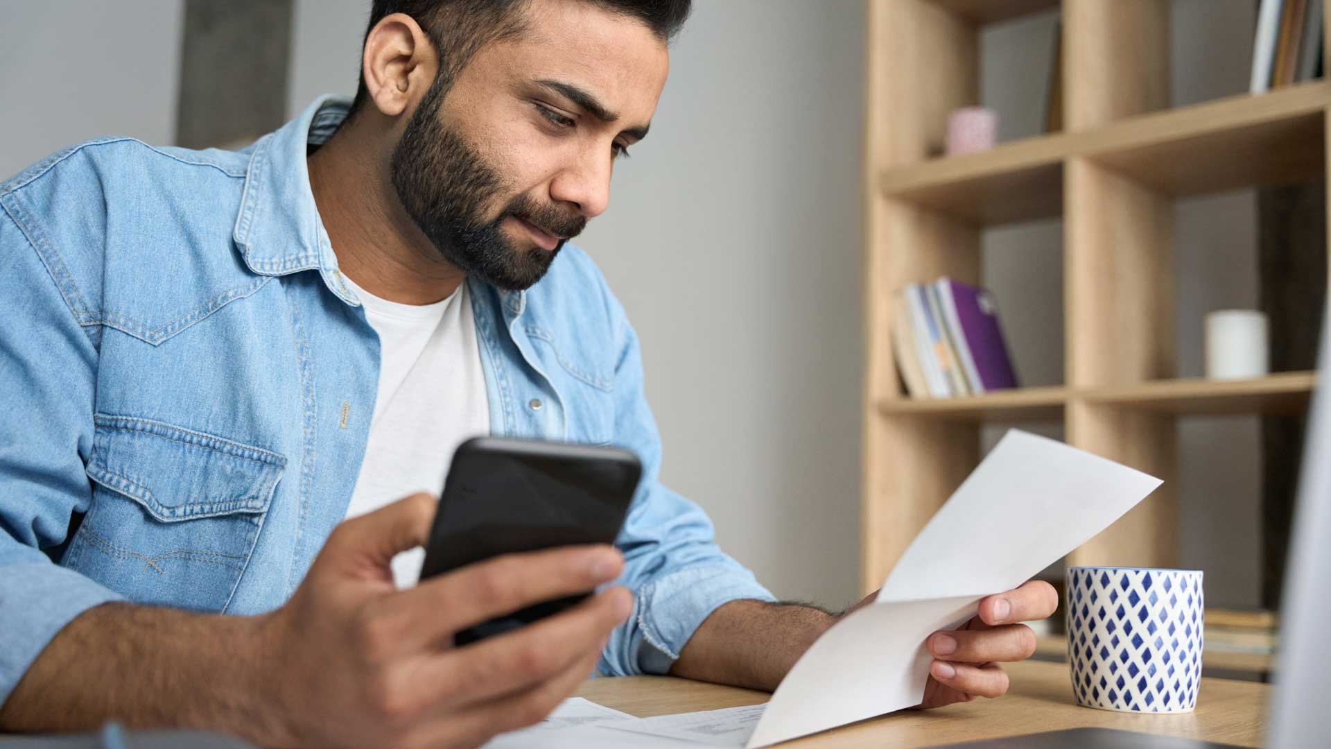 Person looking at bills