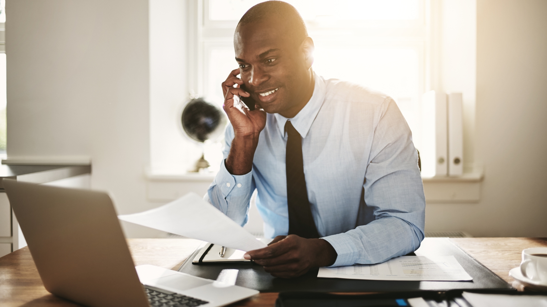 Smiling person at desk