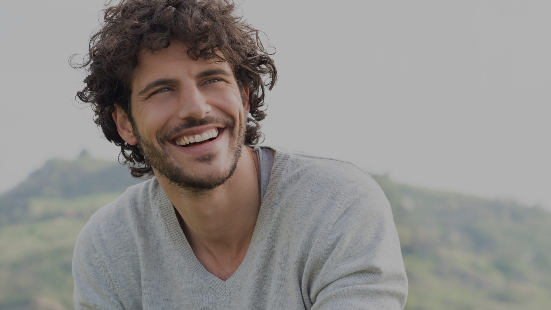 Smiling person outdoors