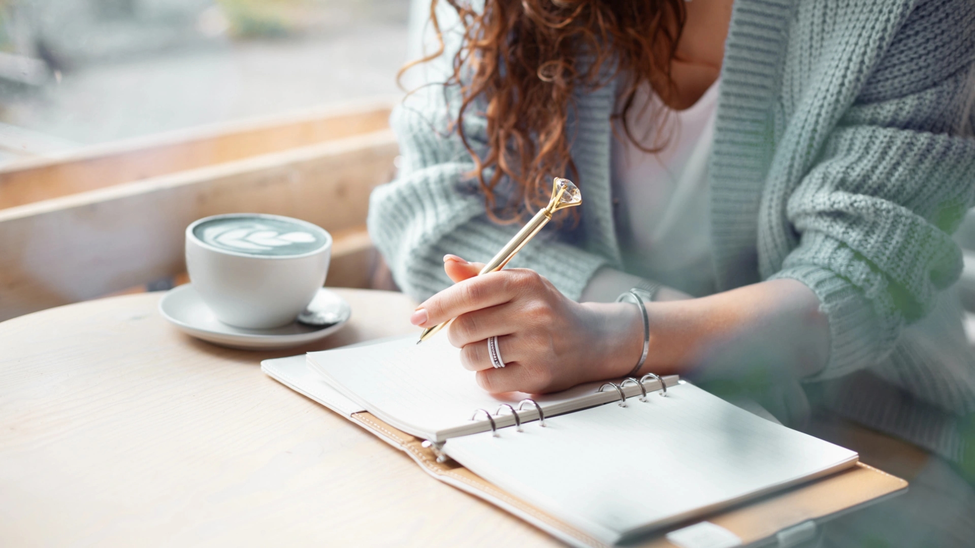 Thoughtful person journaling