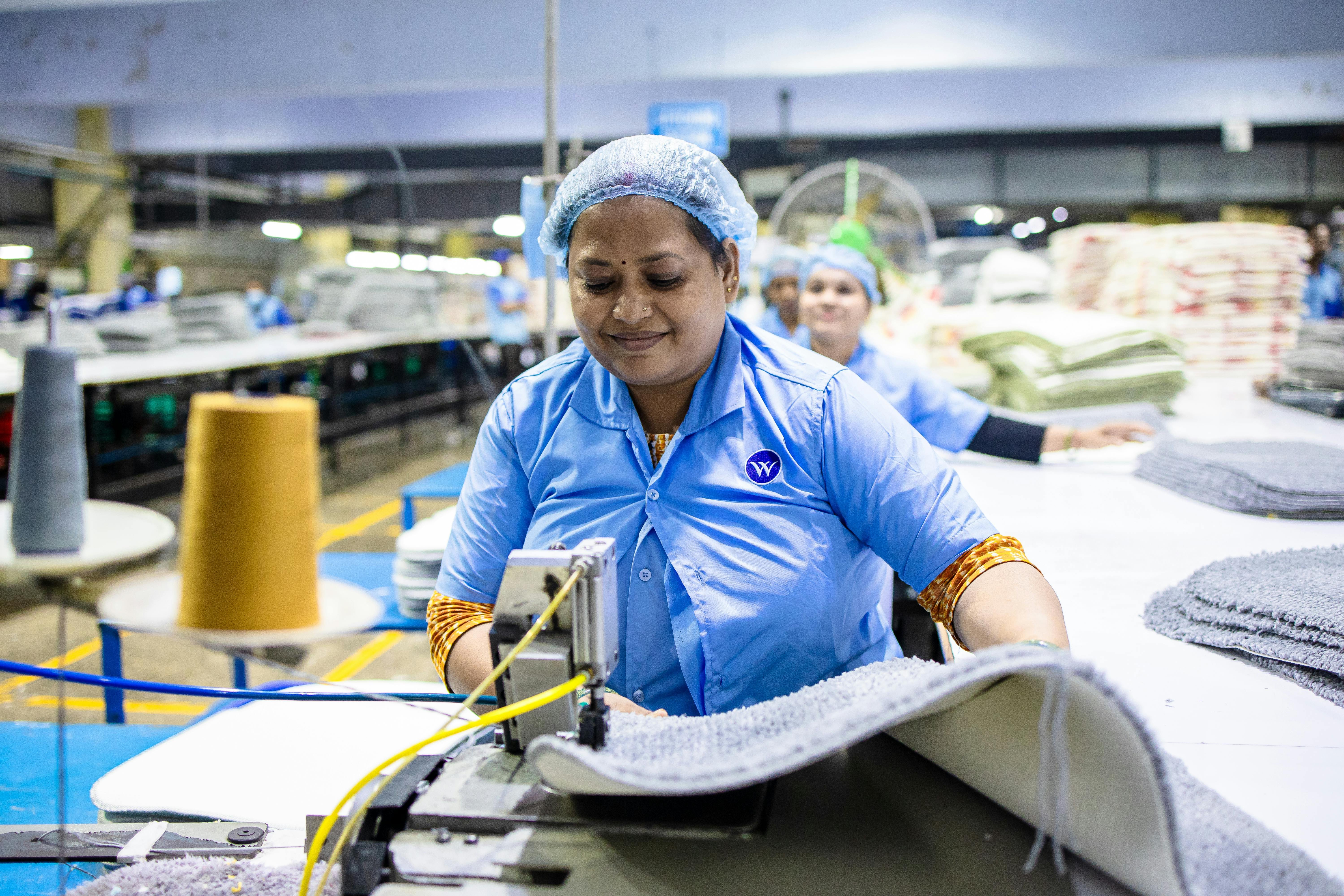 Blue collar worker smiling
