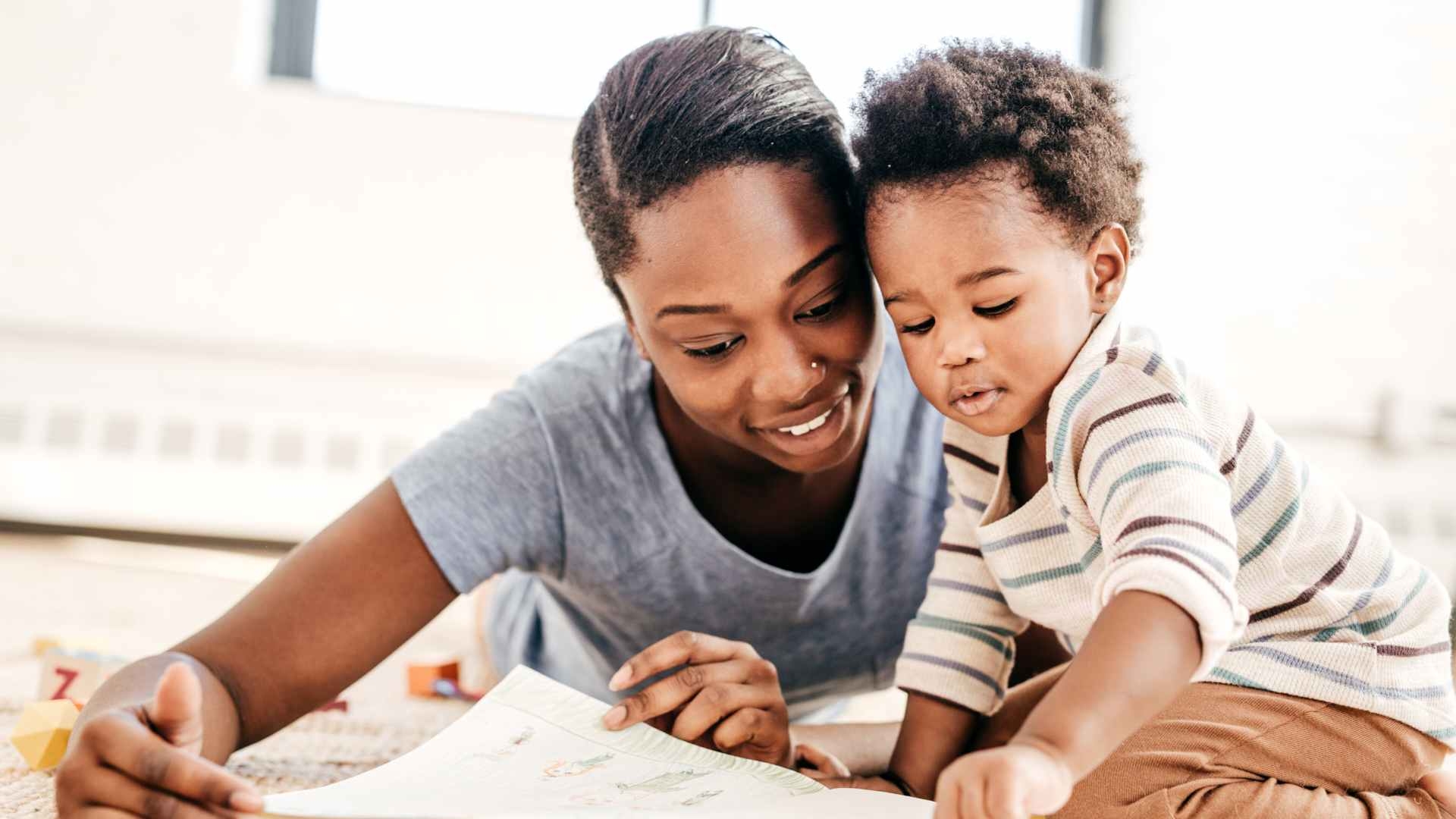 Child reading workbook