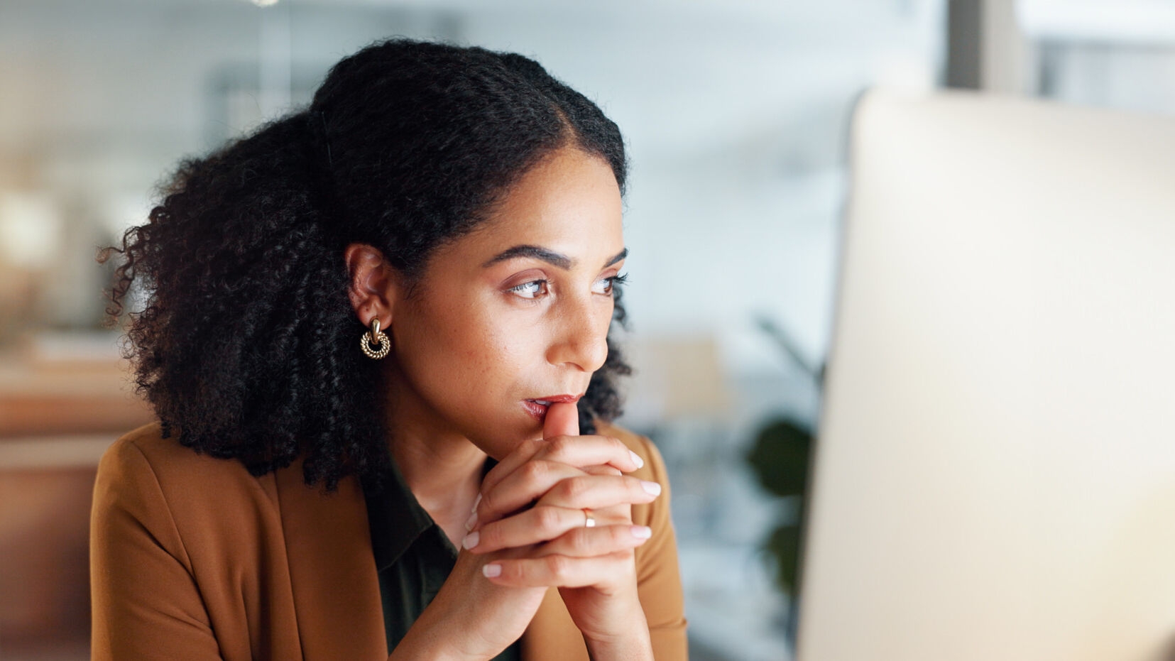Confident woman thinking