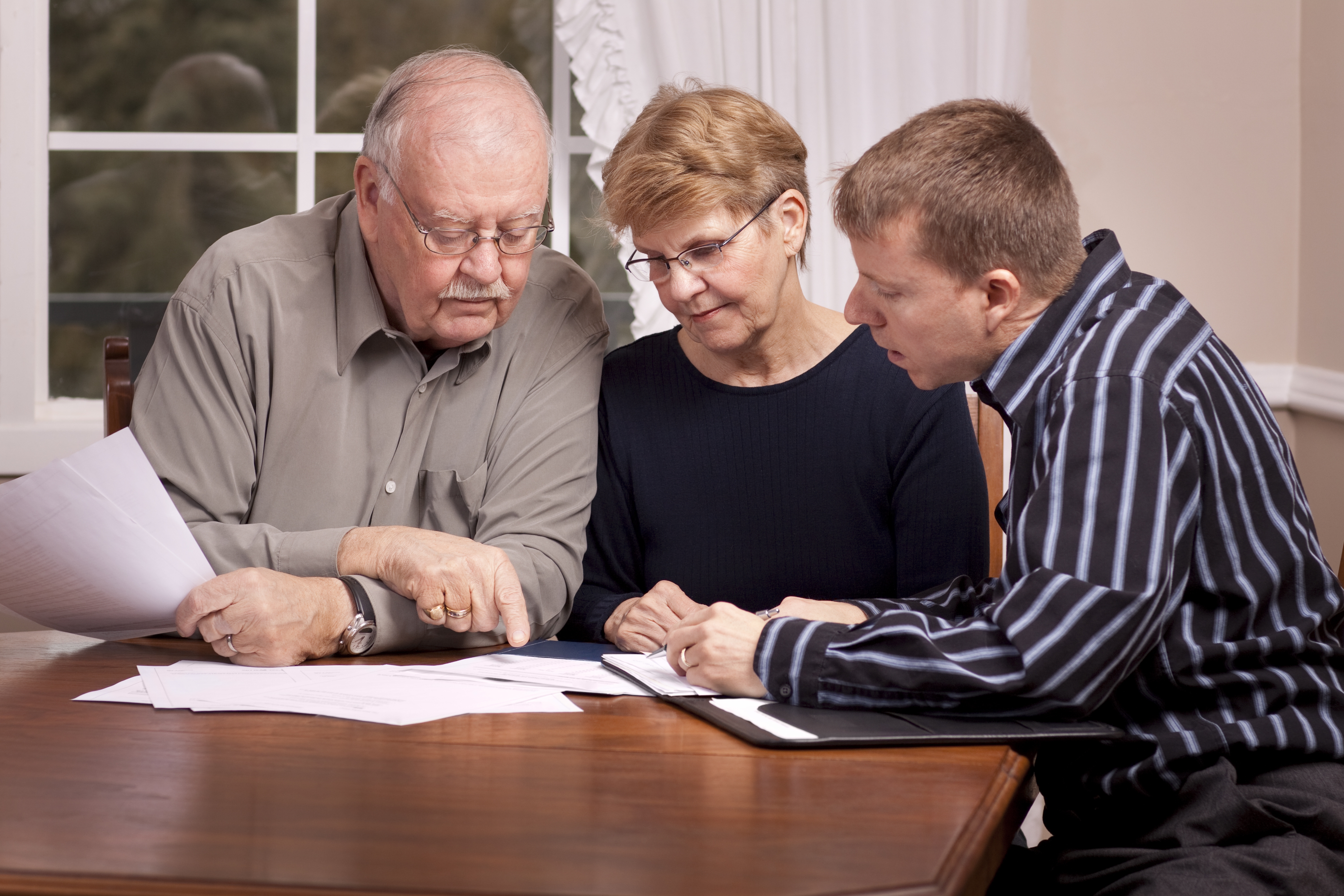 Family discussing at table