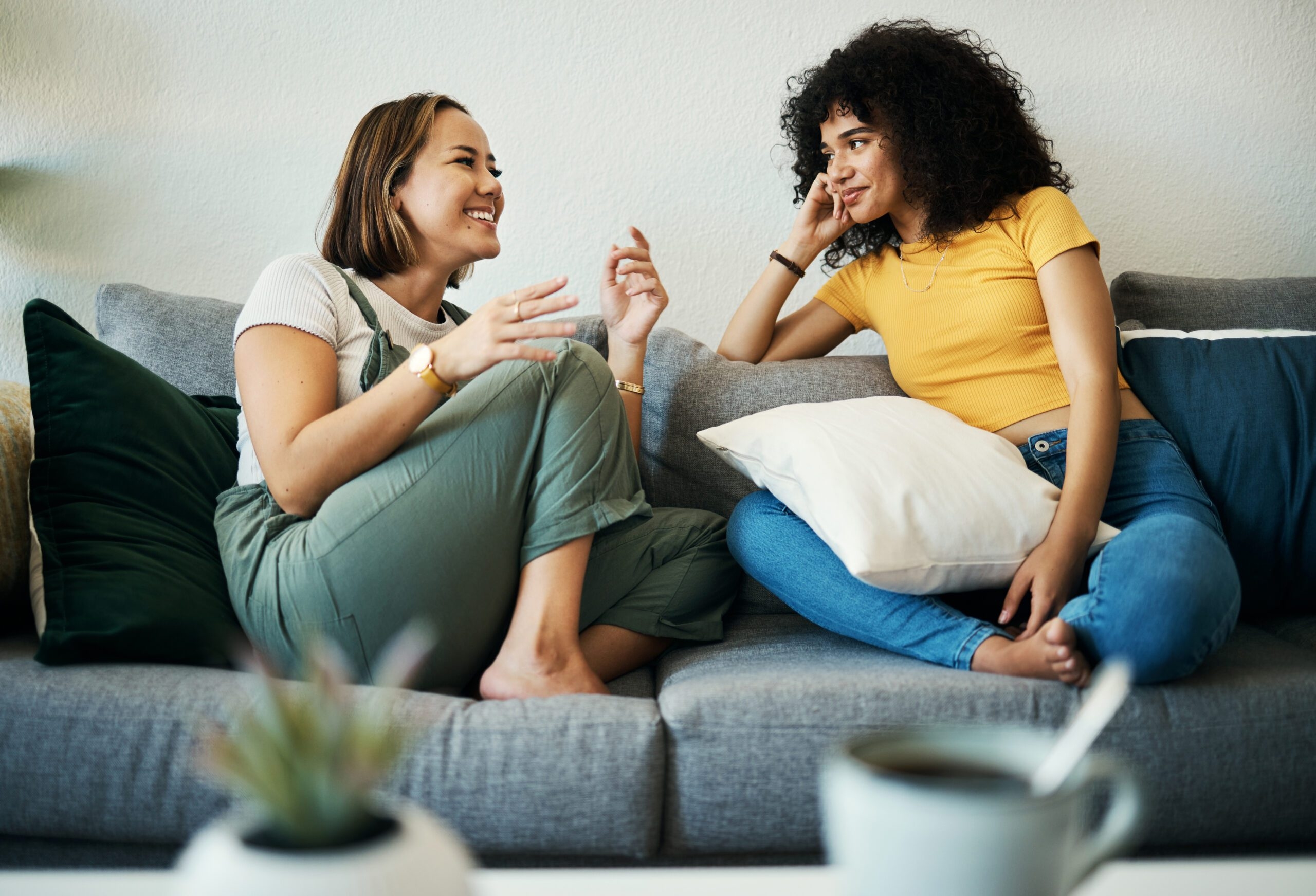 Friends talking on couch