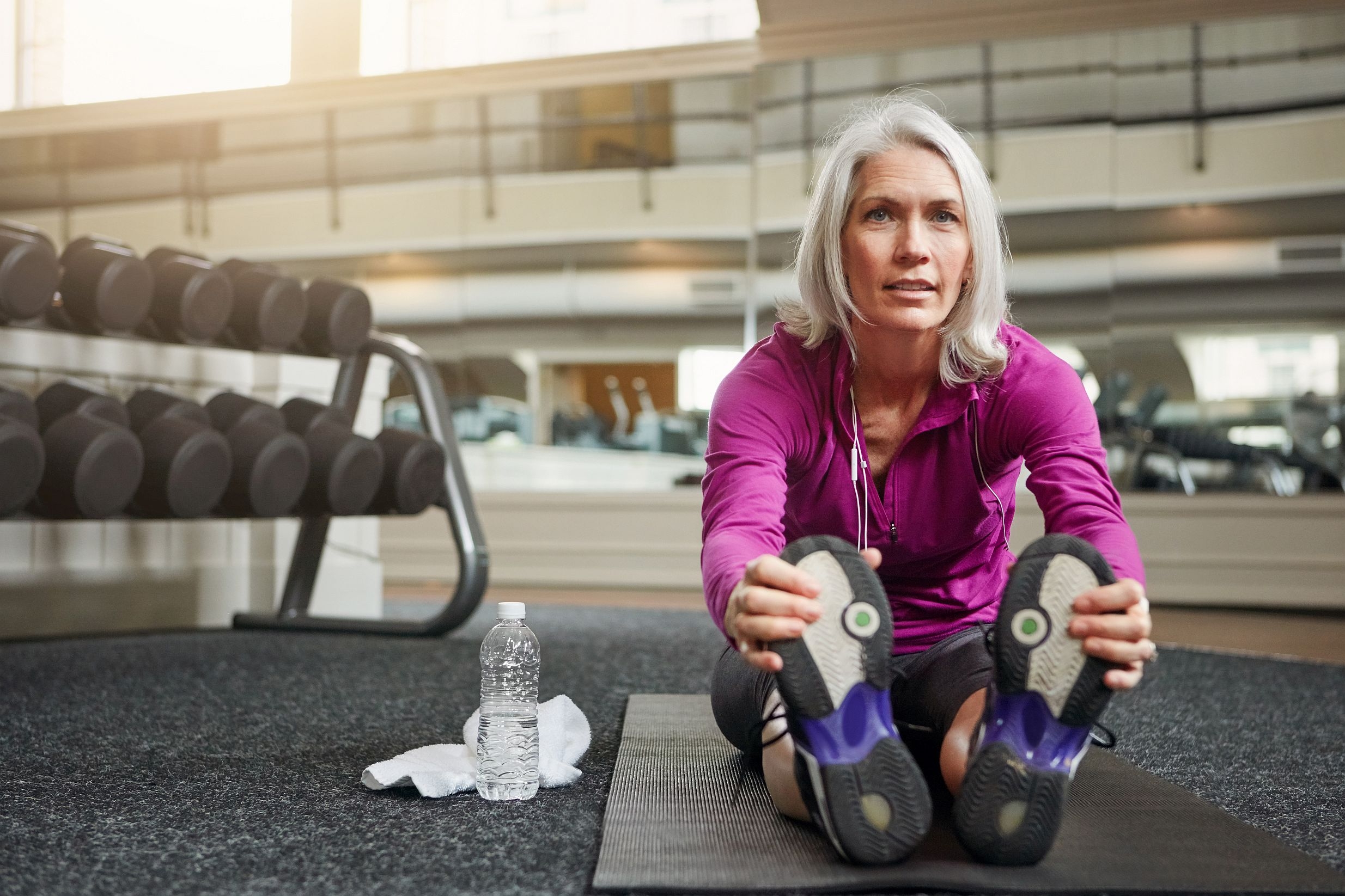 Happy person stretching after workout