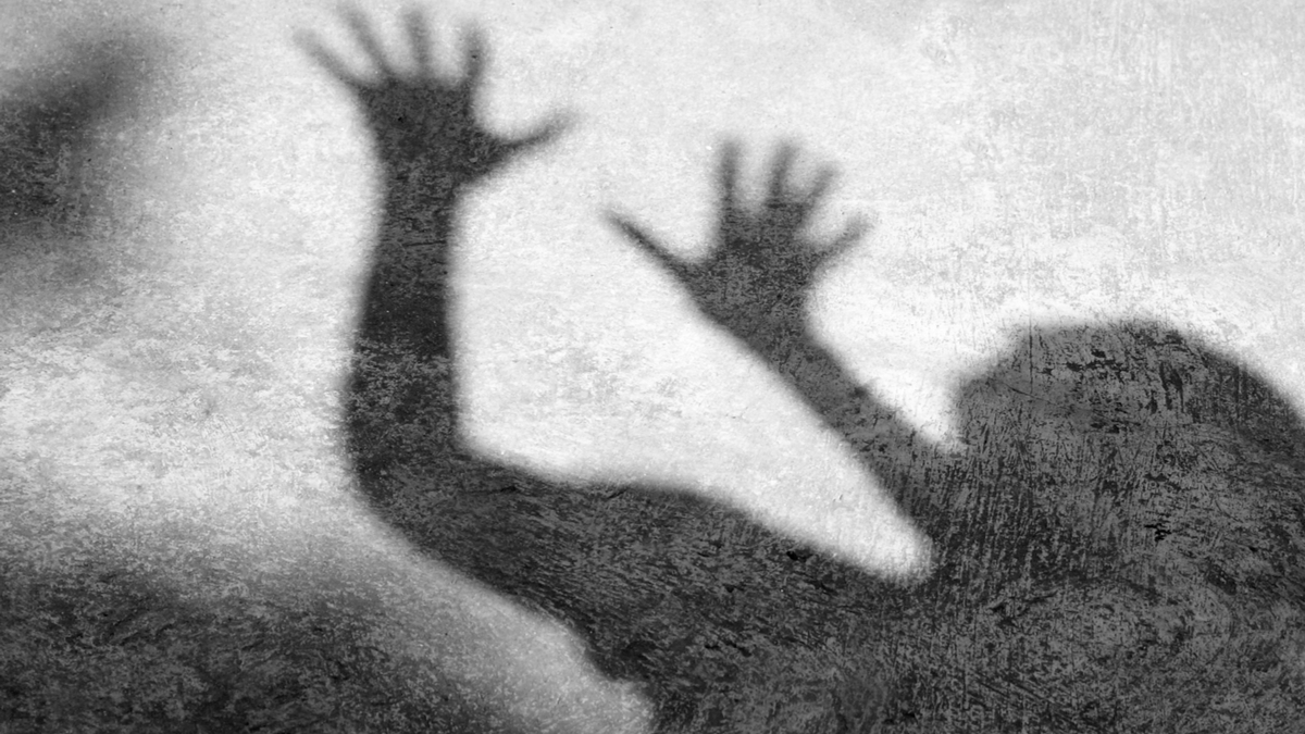 Man in shadow