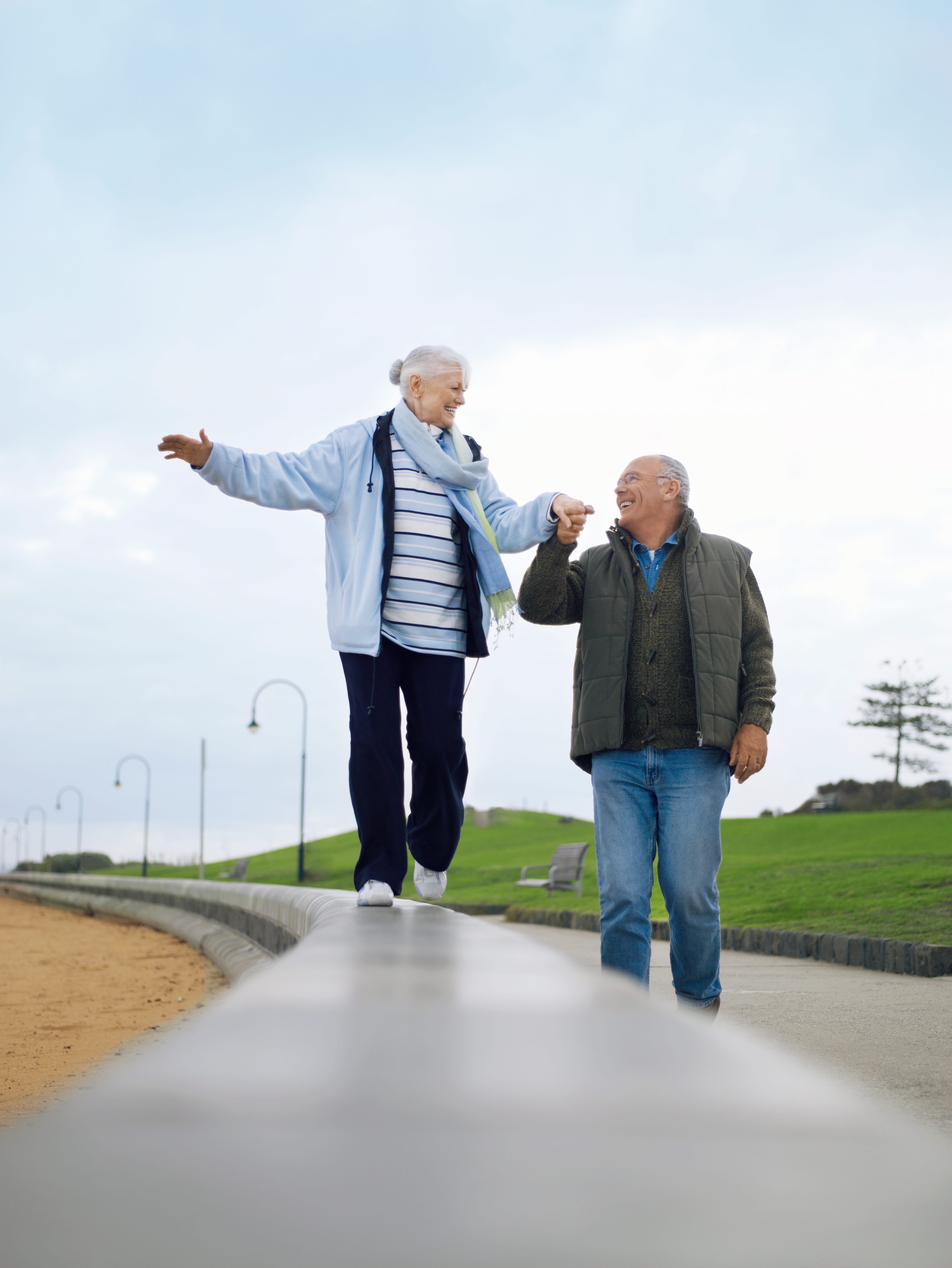 Older couple walking outdoors