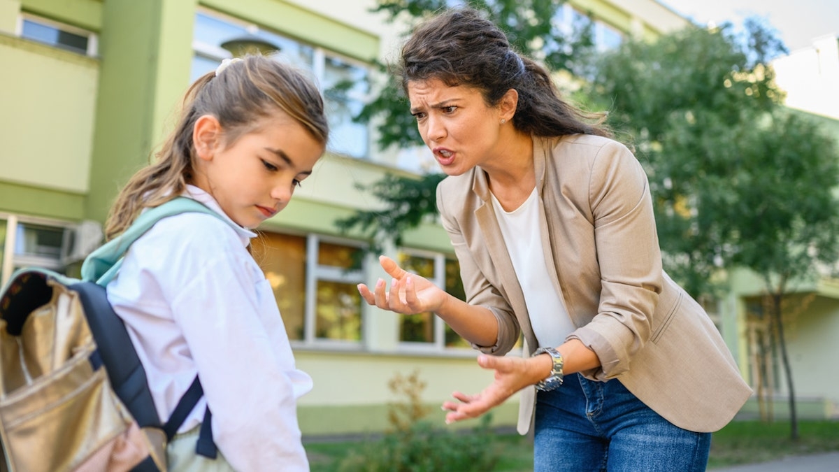 Parent scolding child