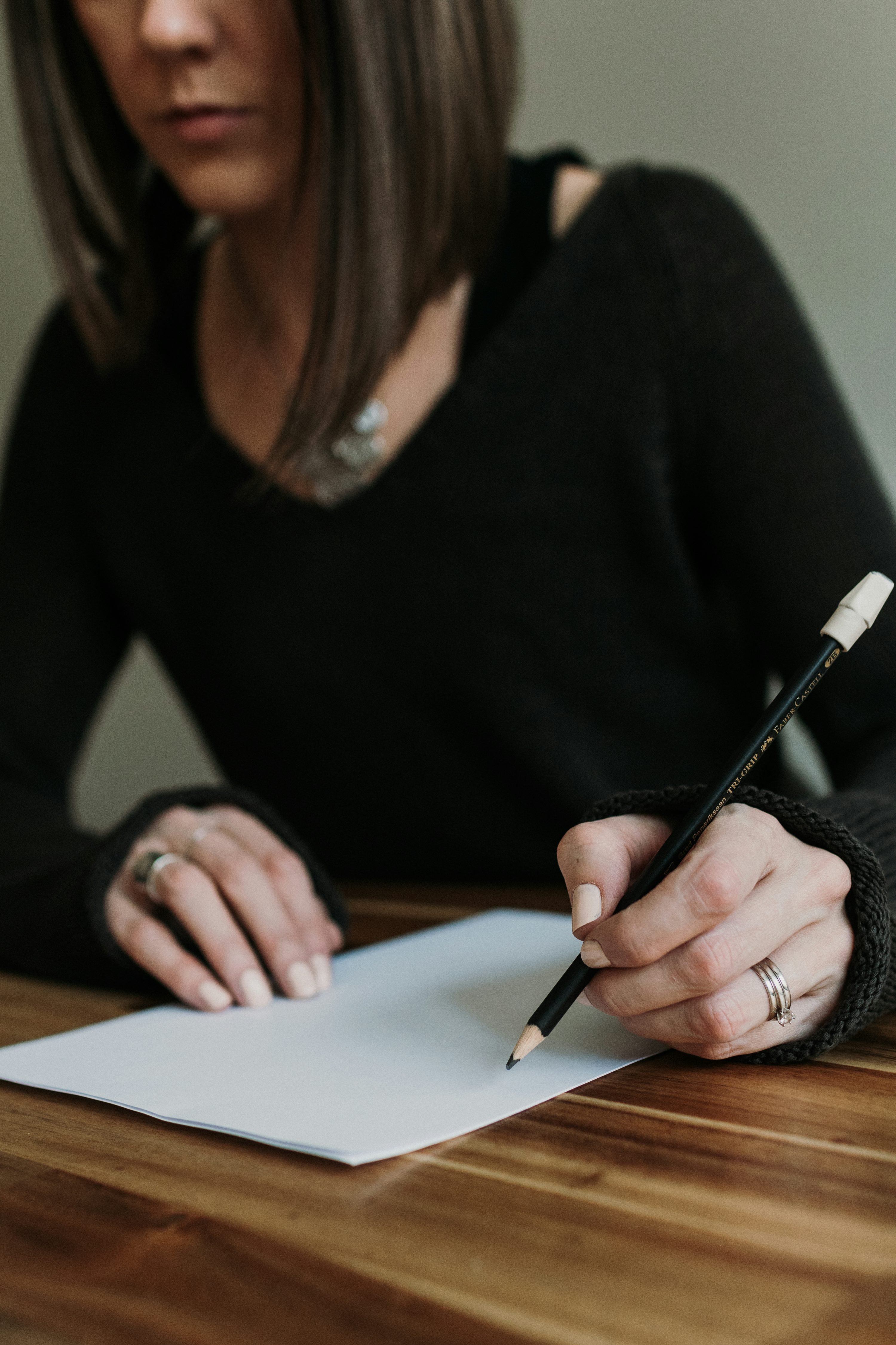 Person journaling at table