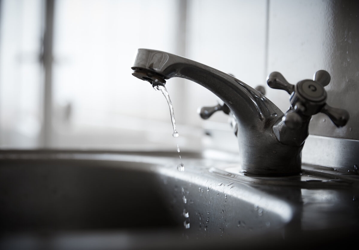 Person letting water run