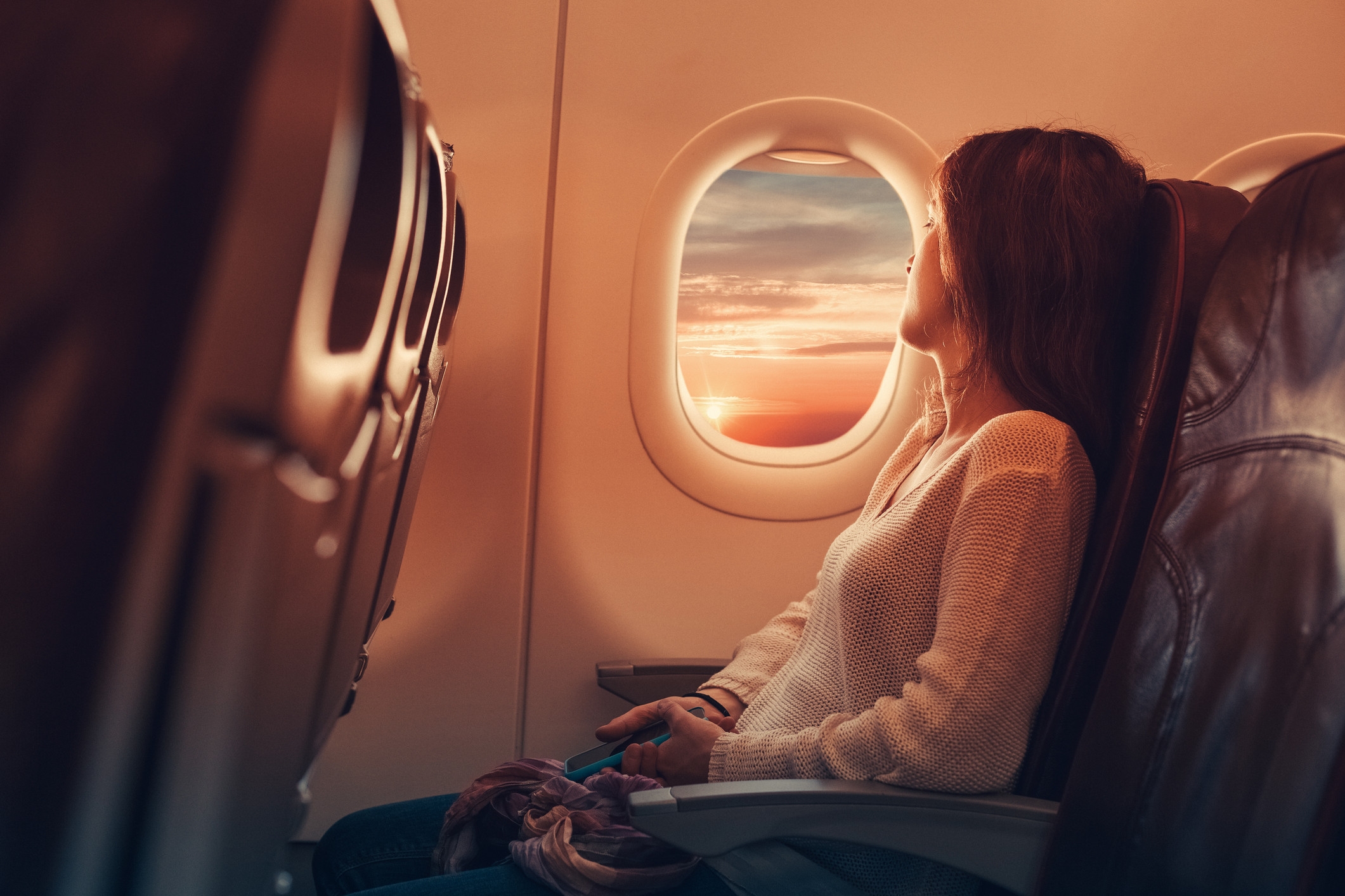 Person offering seat to stranger