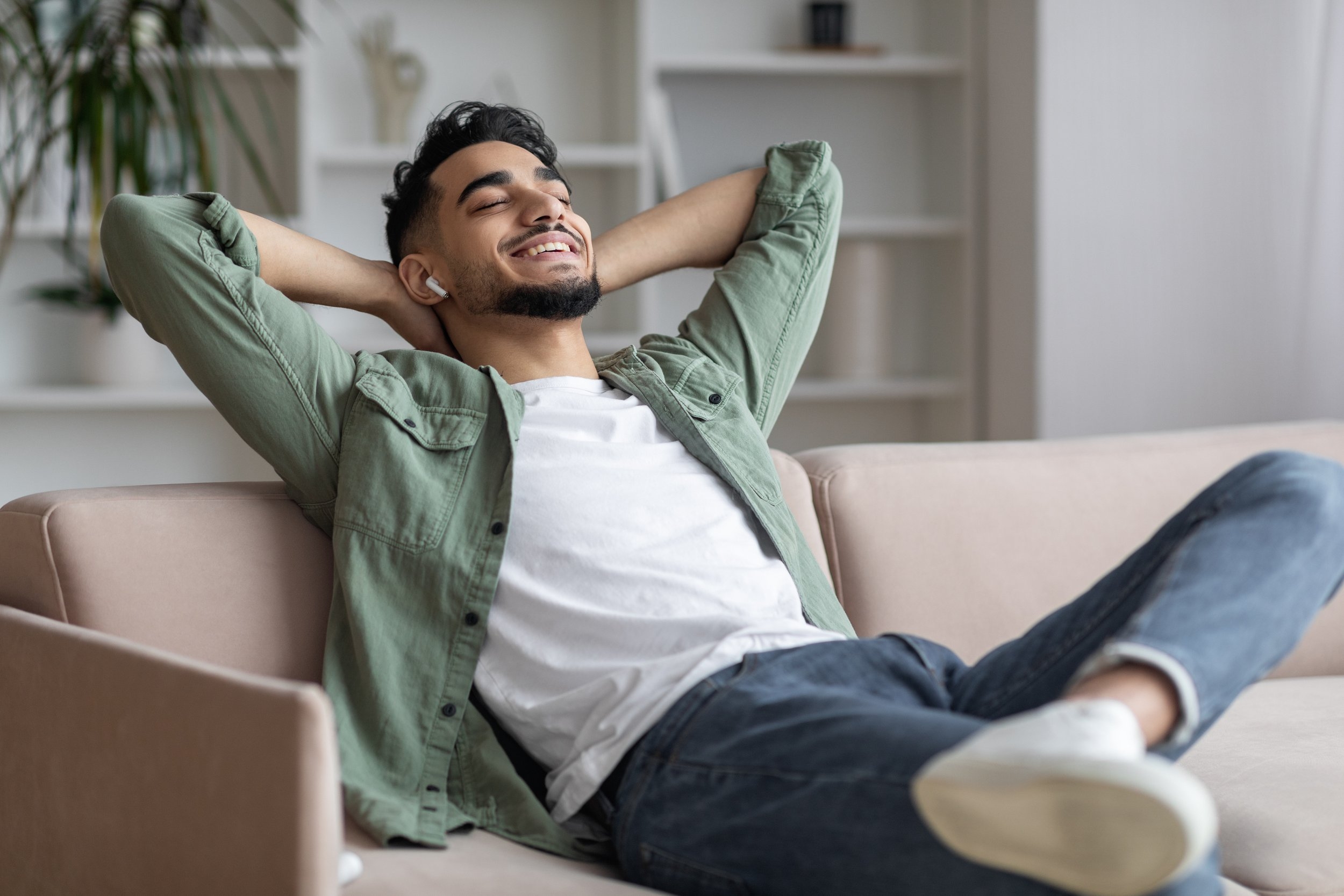 Person resting on couch