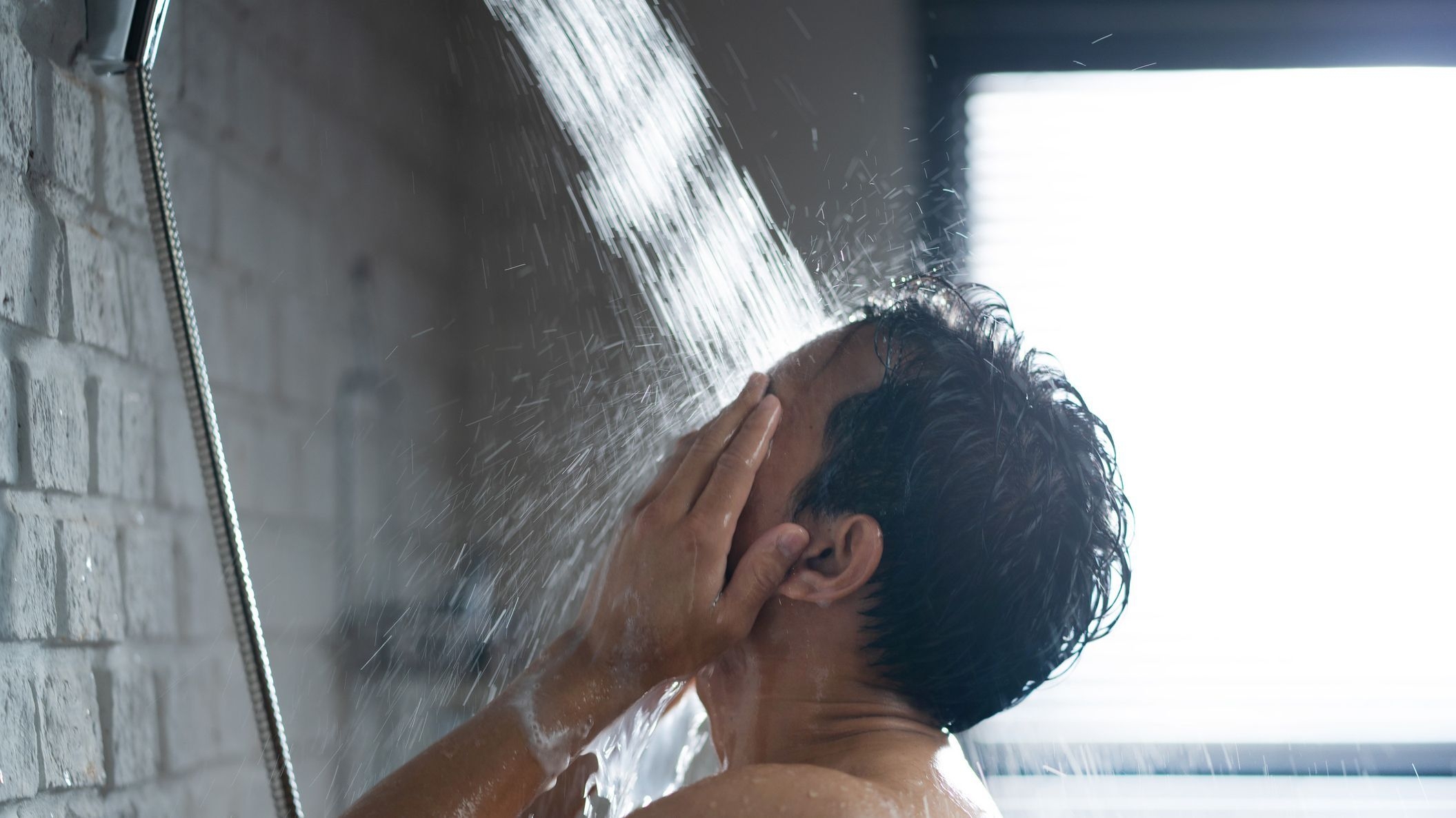 Person showering at night