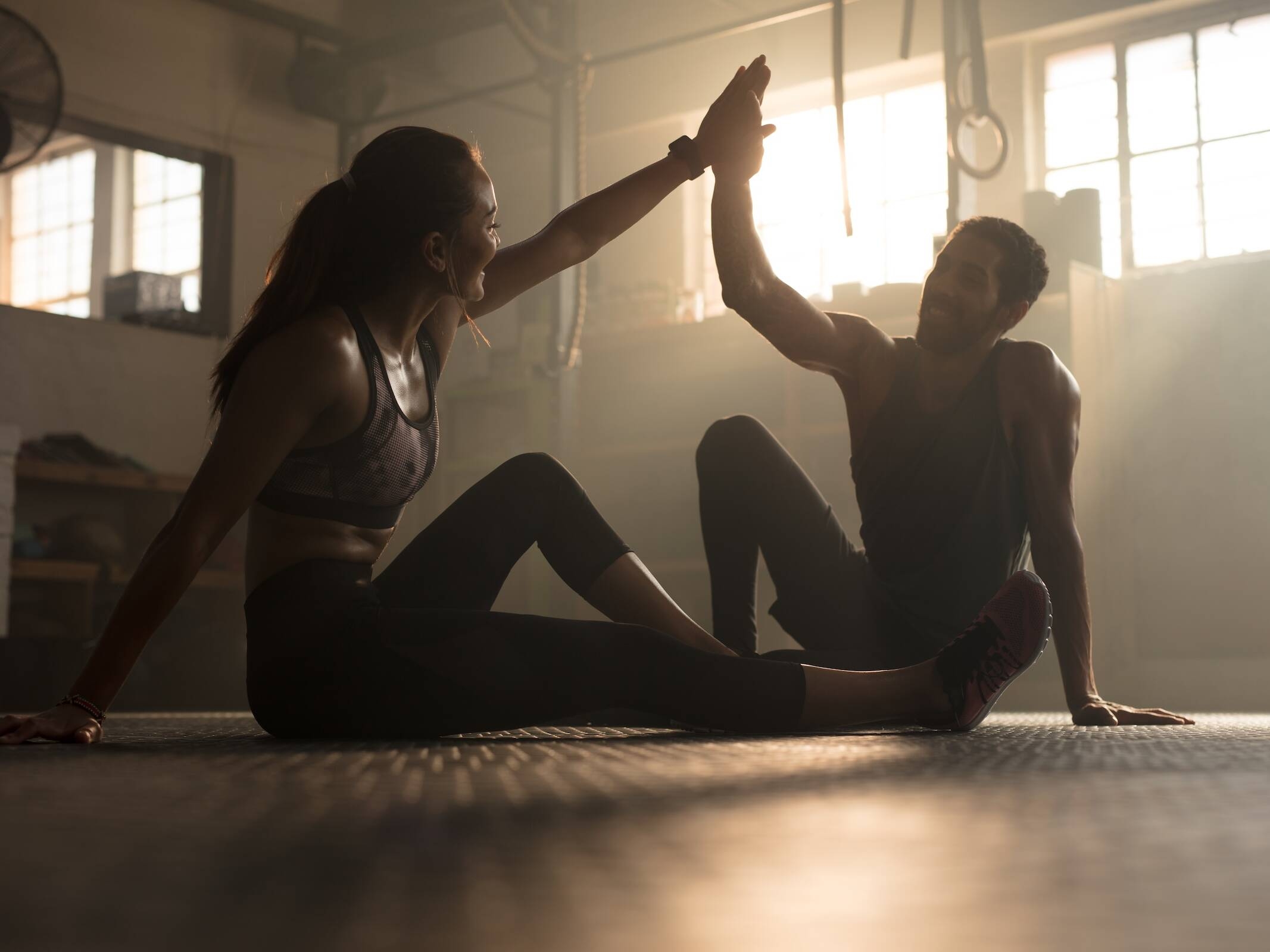 Person stretching in steam