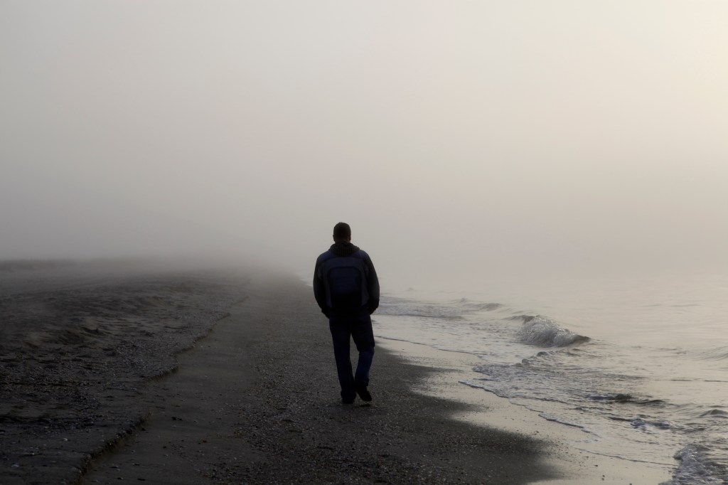 Person walking outside in early morning