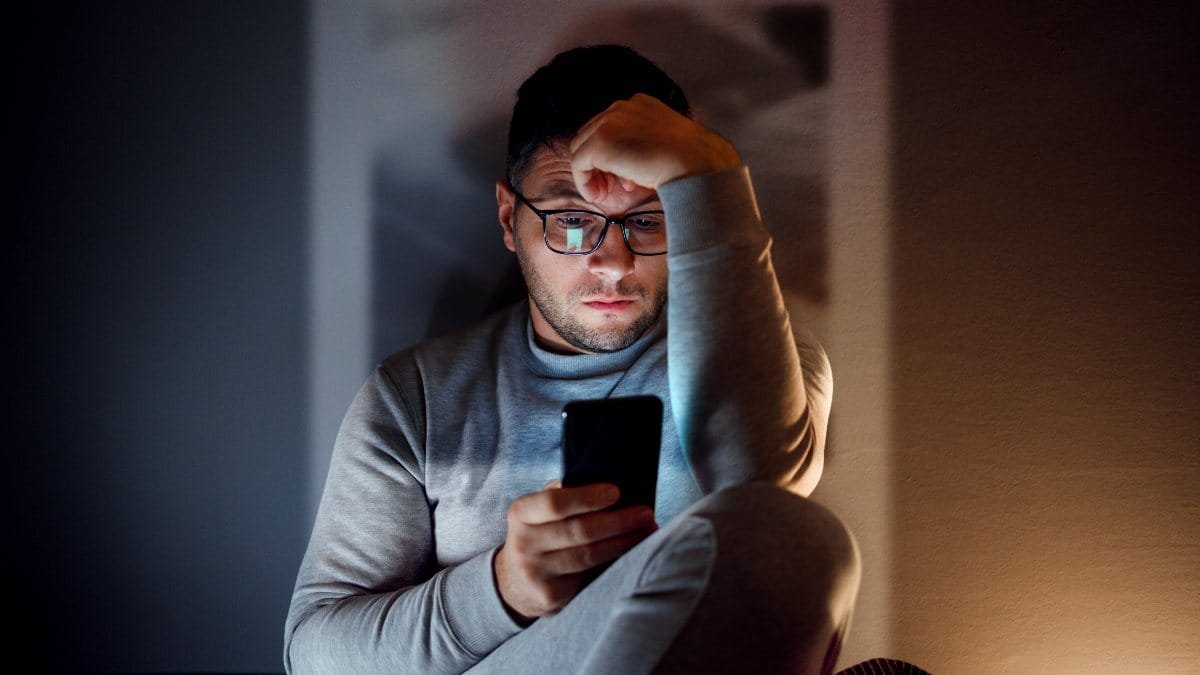 Sad person texting