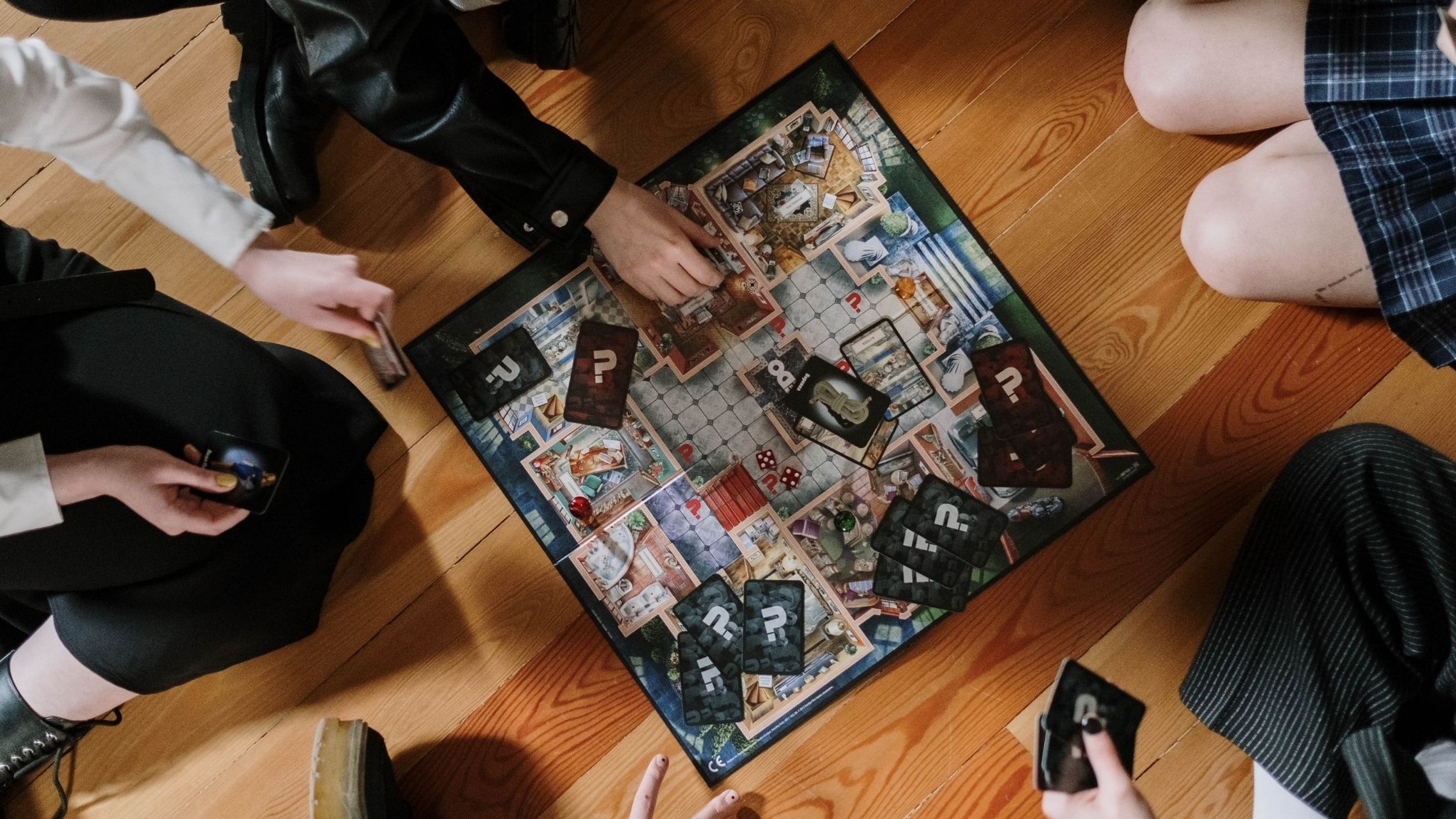 Young adults playing board games