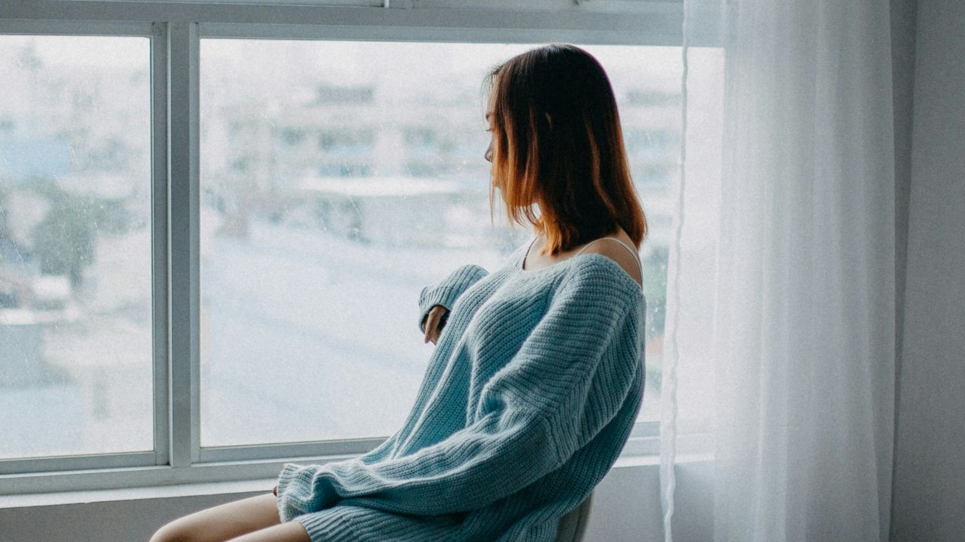 Woman by window