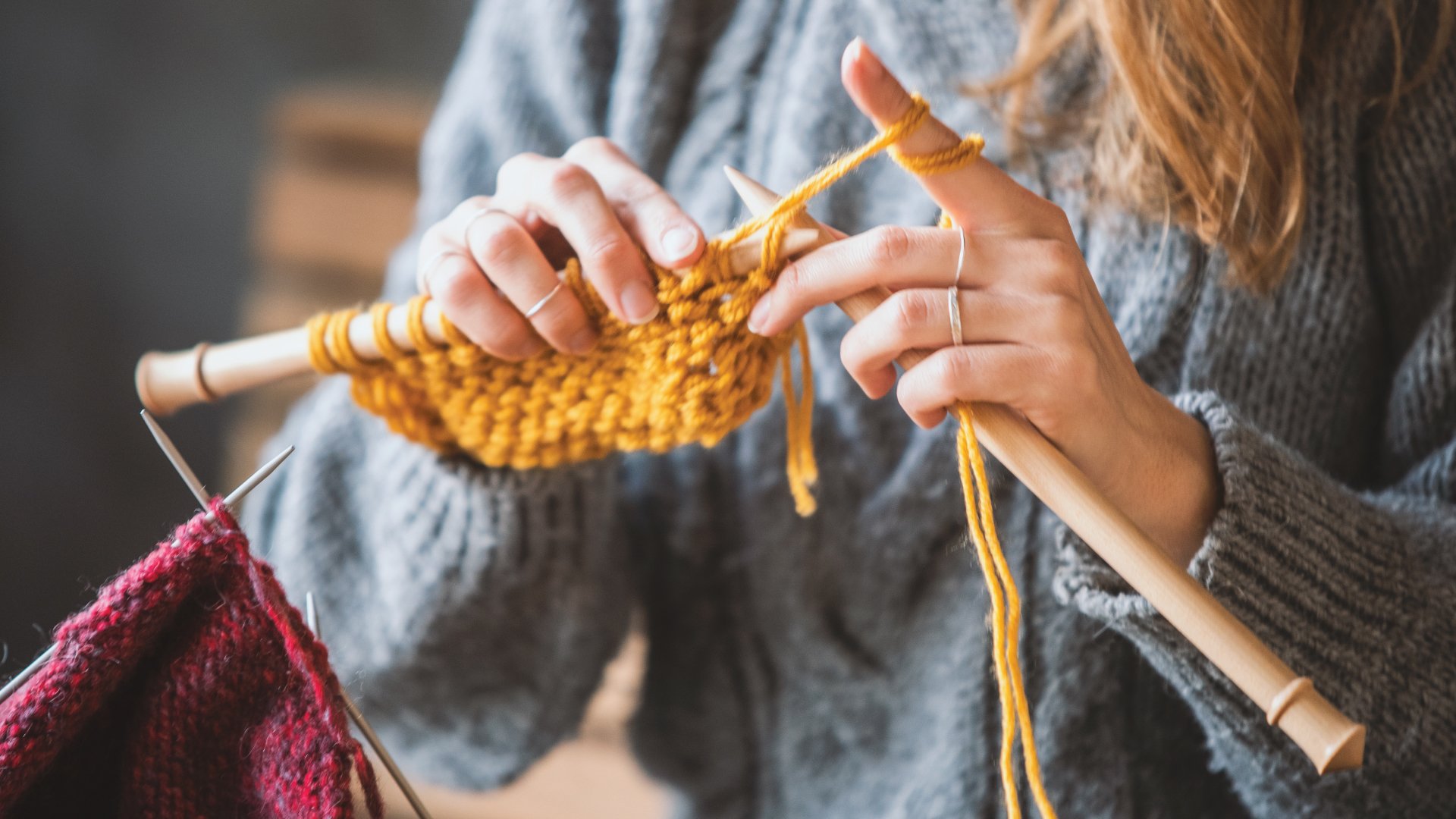 Hands knitting yarn