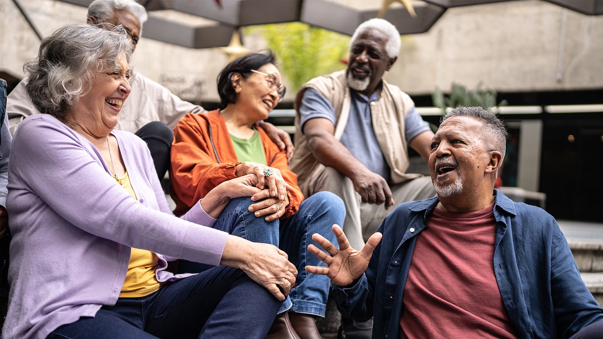 Older friends laughing