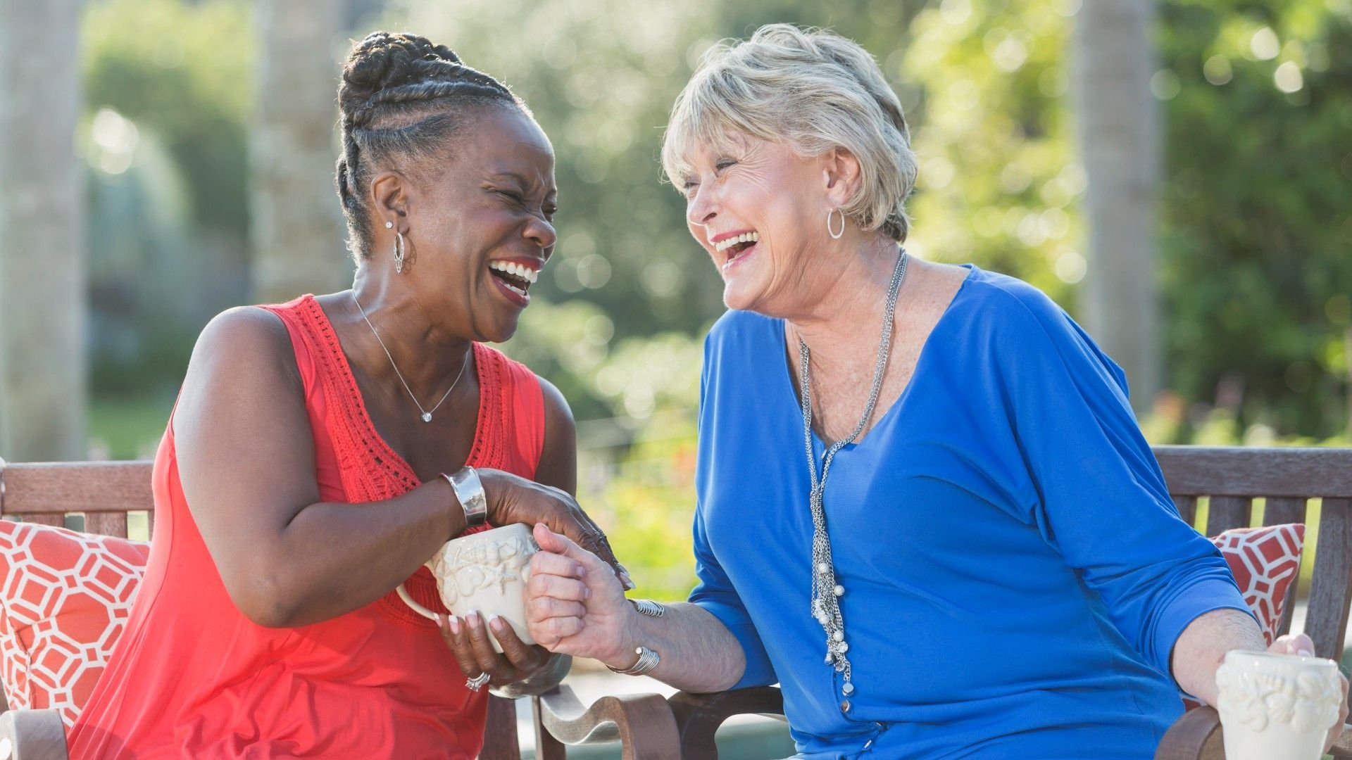 Older friends laughing