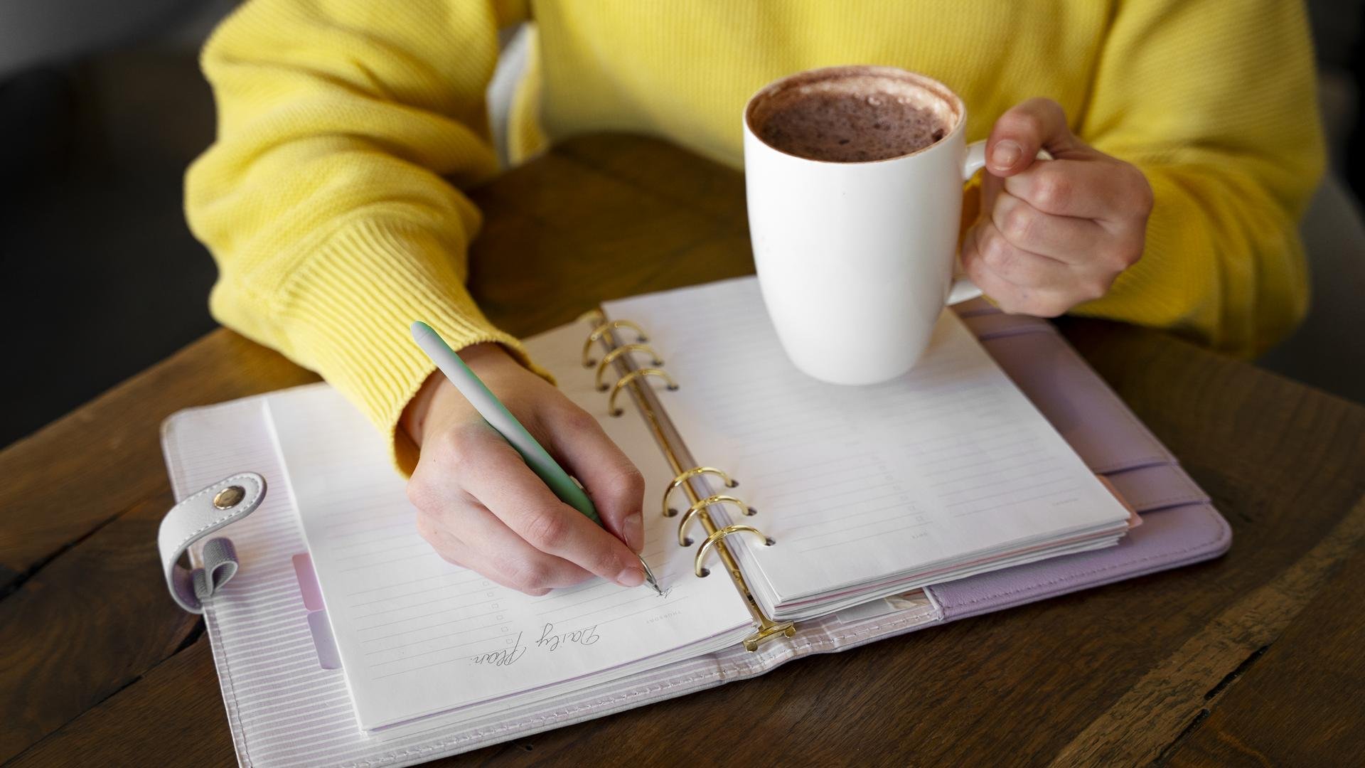 Person journaling morning