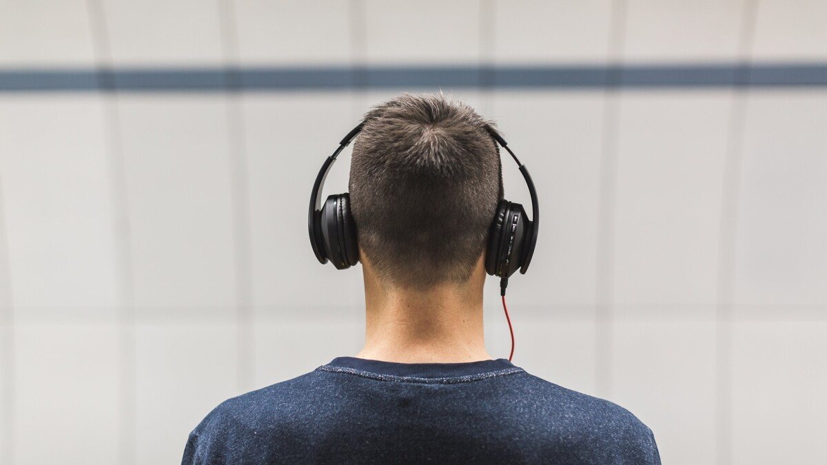 Person listening headphones