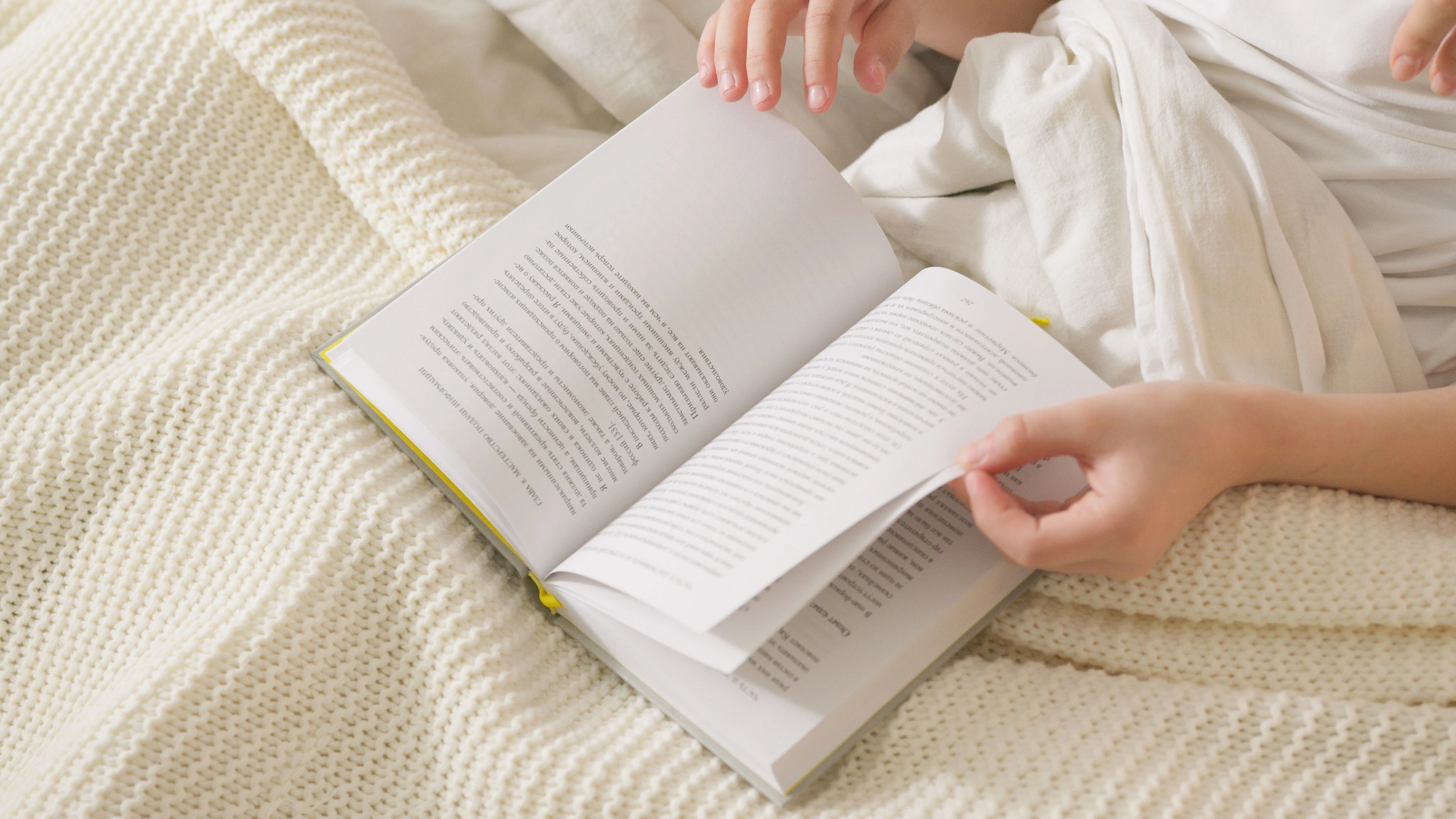 Person reading in bed
