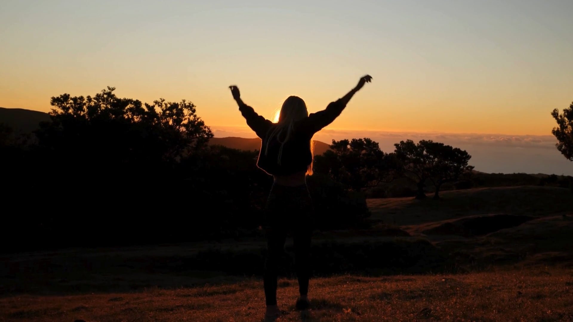Person stretching sunrise
