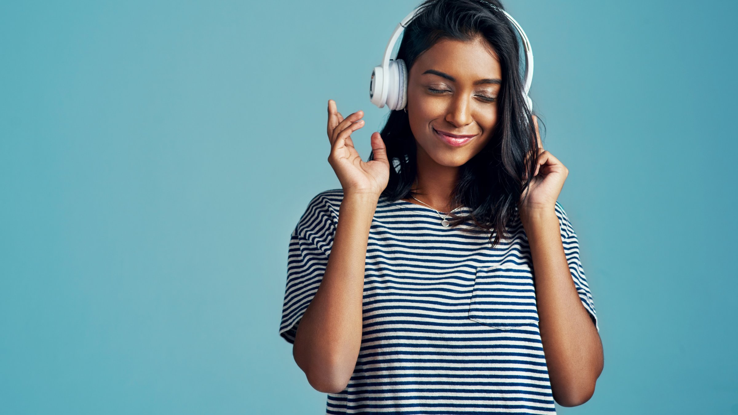 Smiling with headphones