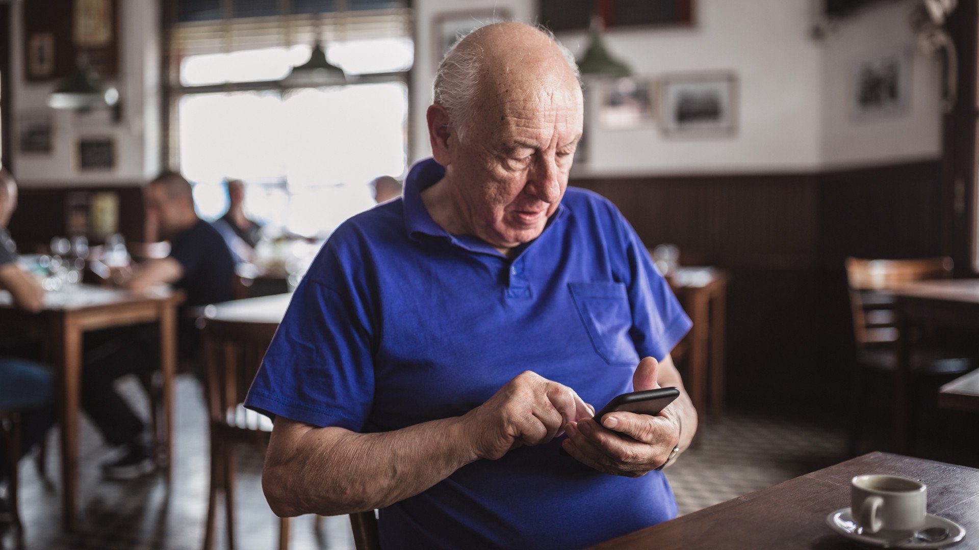 Old man with phone
