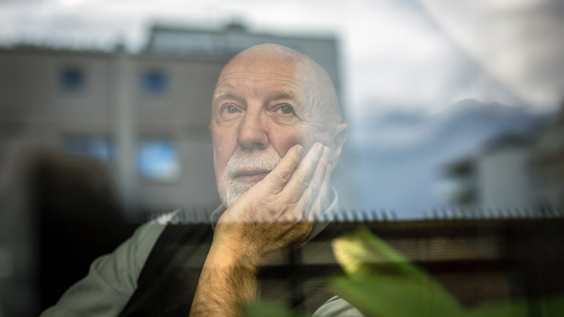 Pensive person window