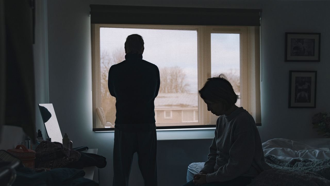 Distant couple indoors