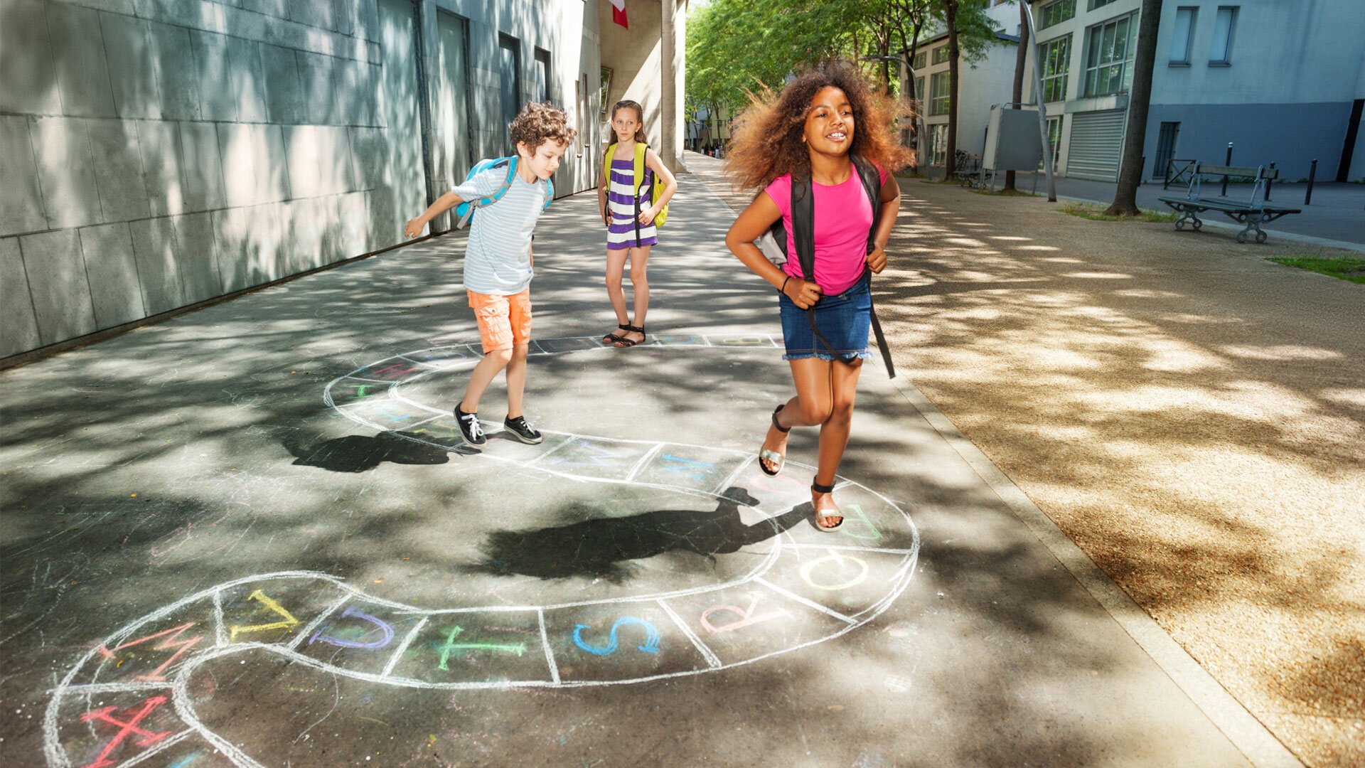 Kids playing hopscotch
