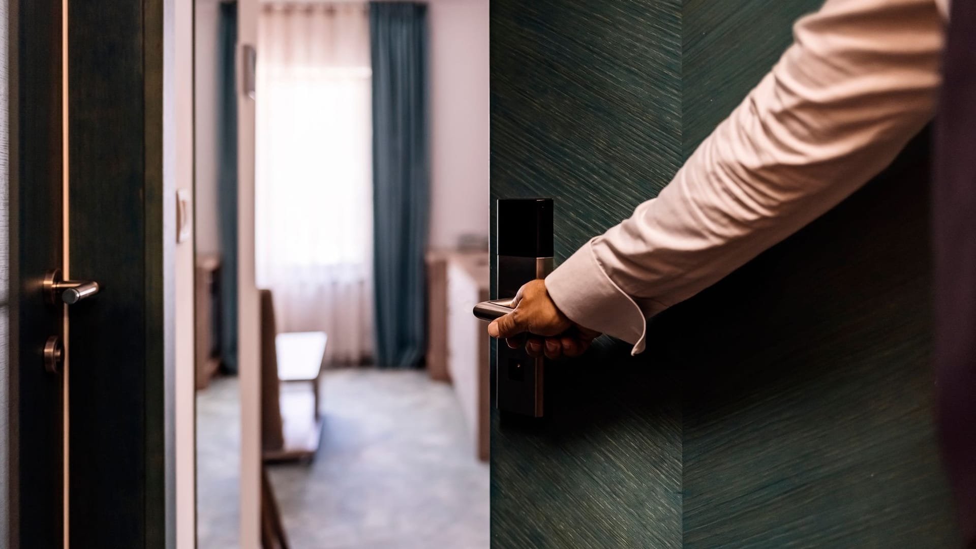 Person holding door