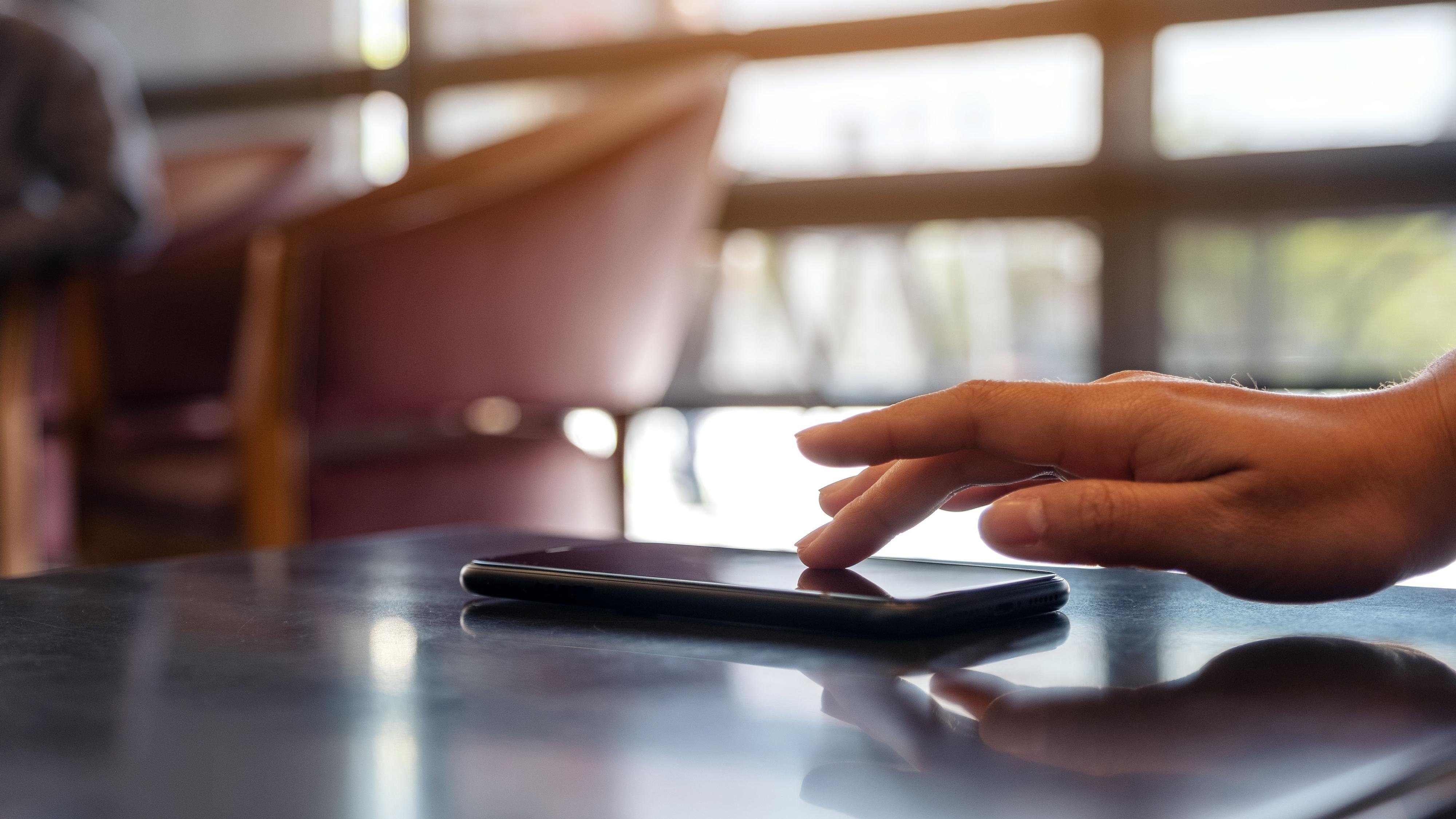 Person scrolling phone