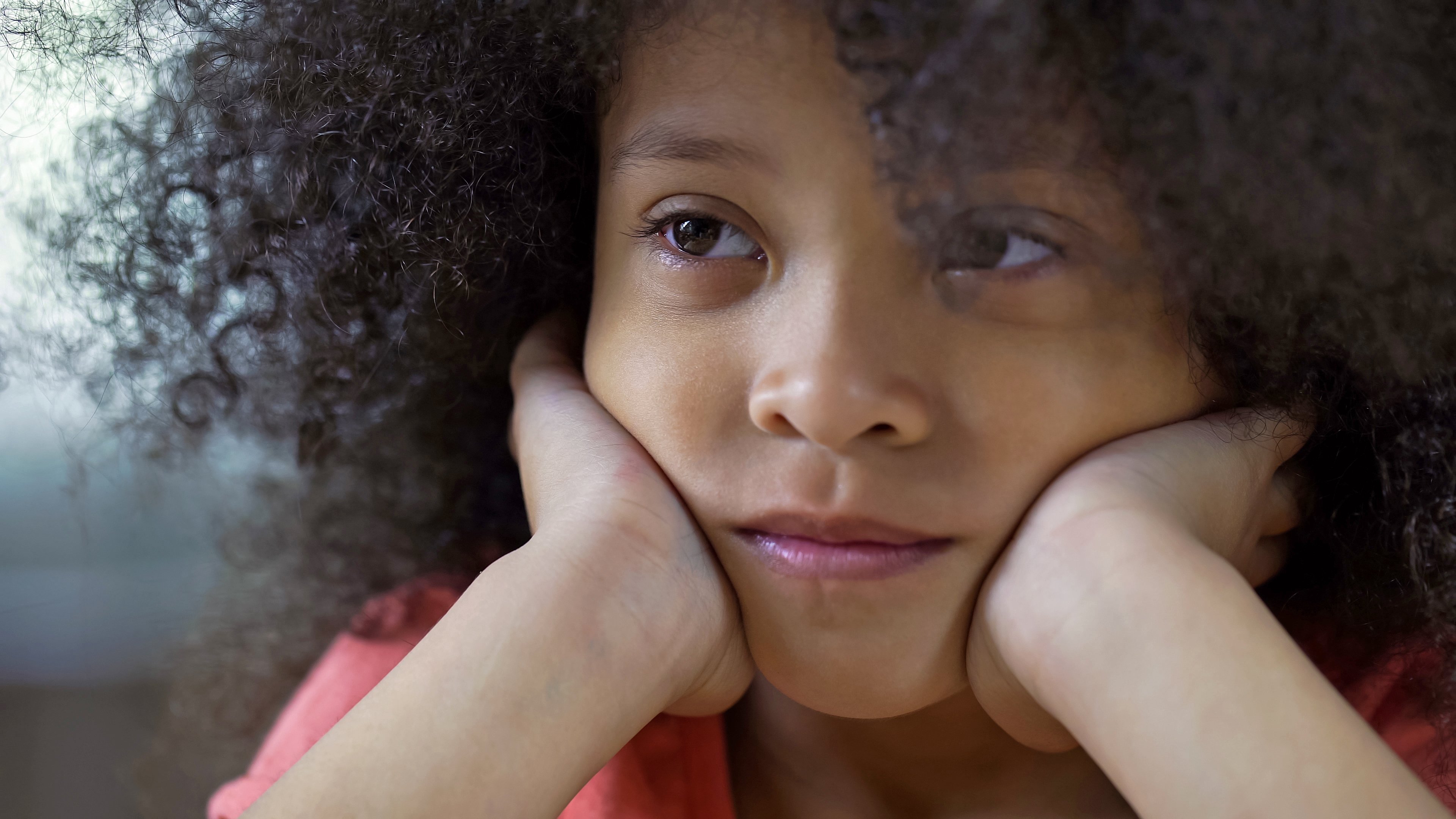 Sad child thinking