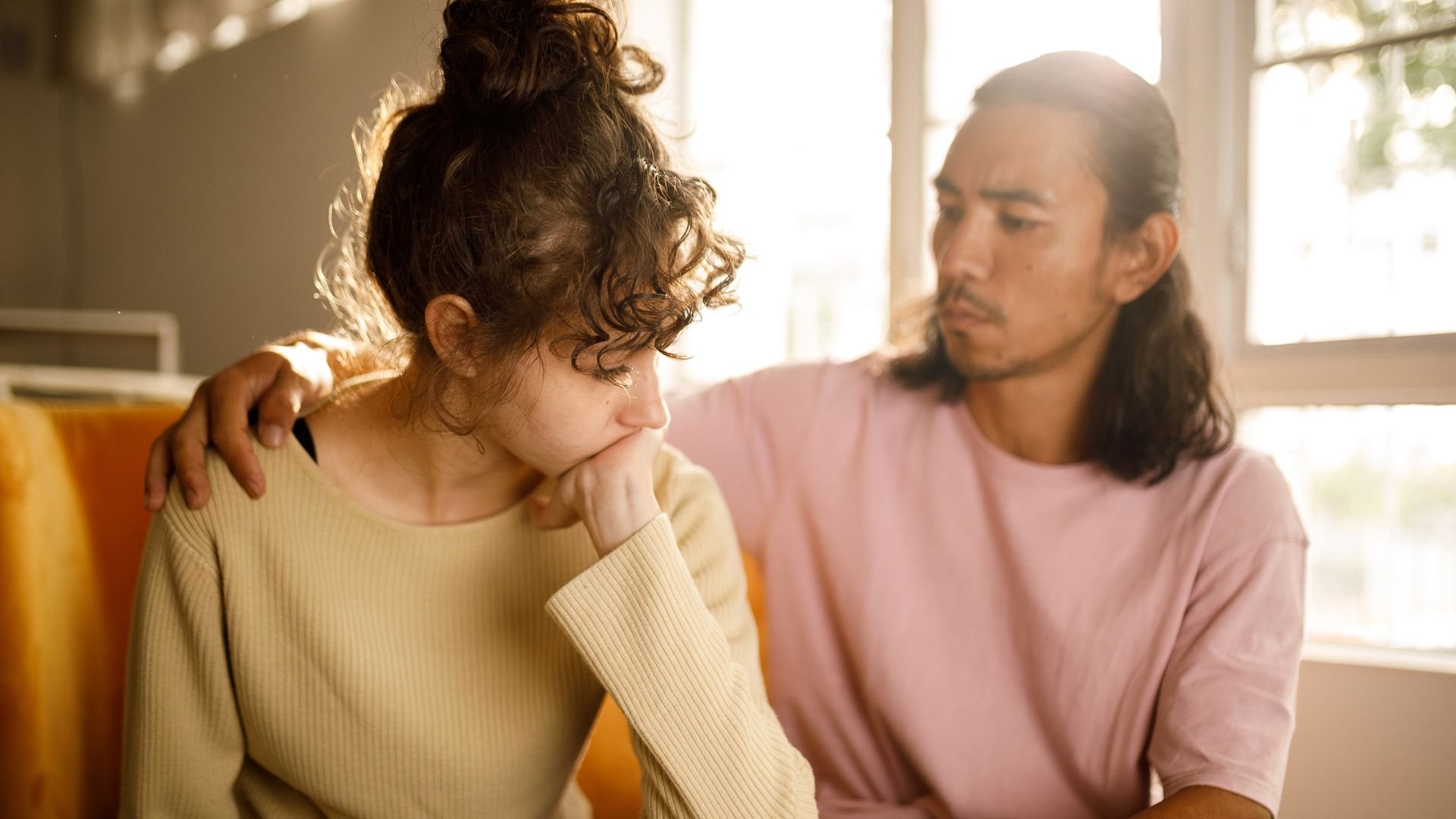 Sad couple indoors