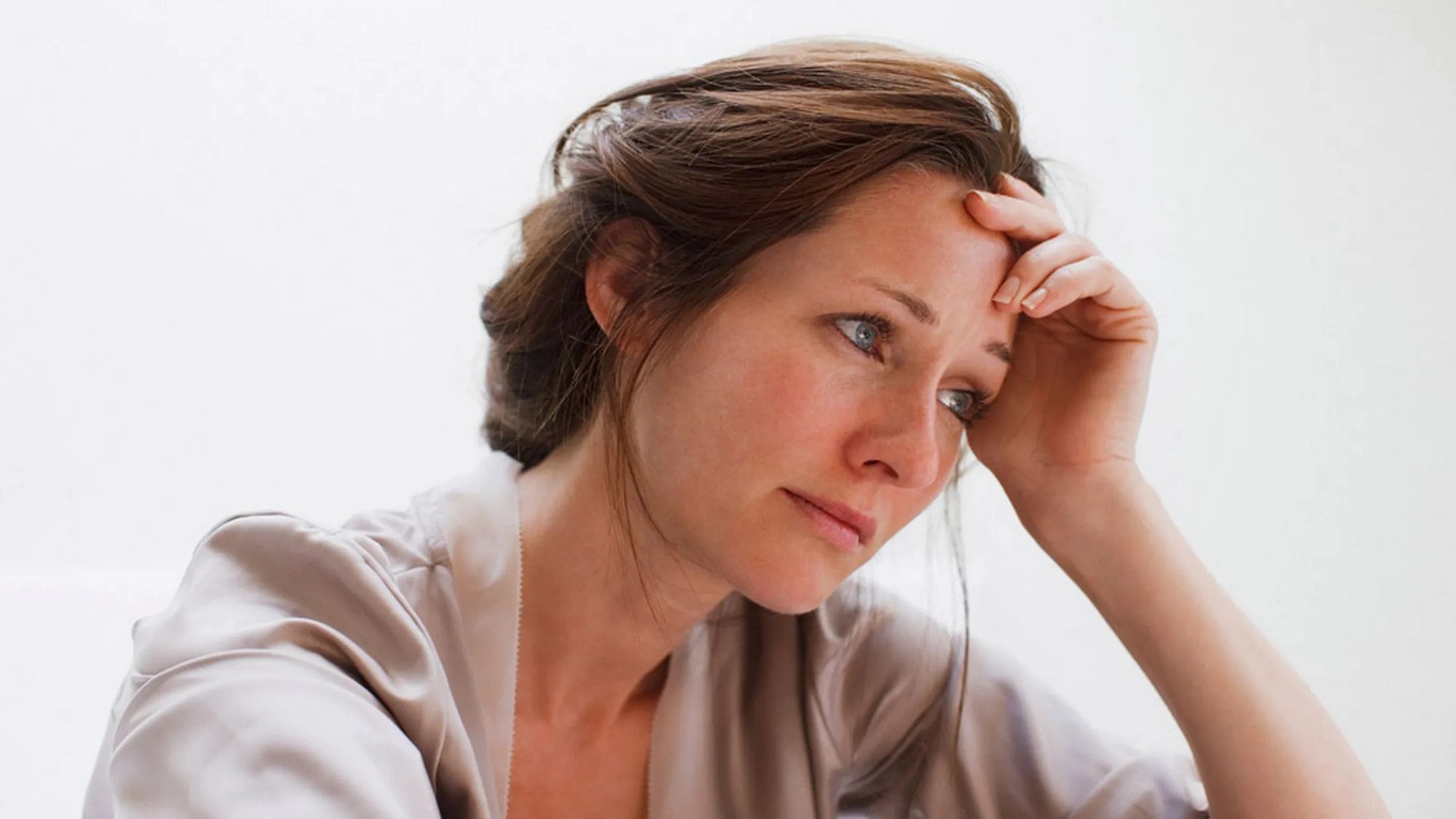 Tense woman indoors