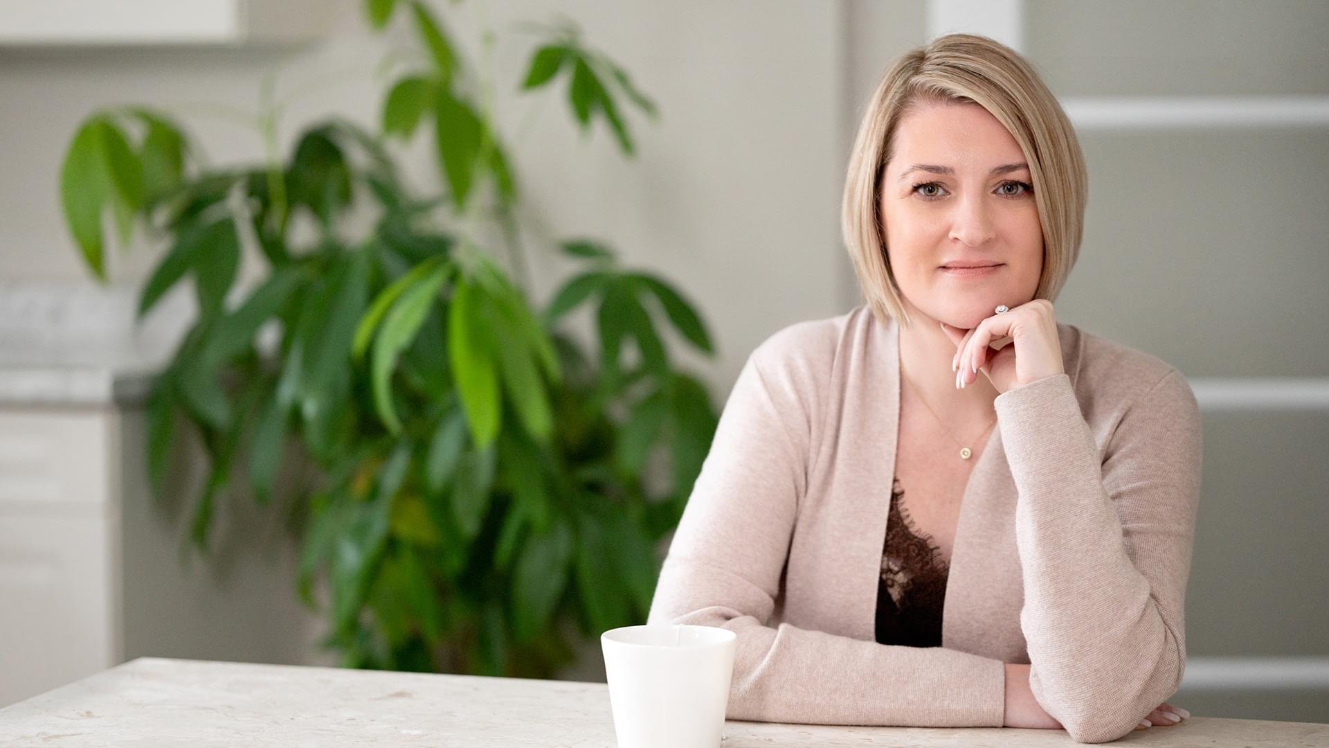 Thoughtful smiling woman
