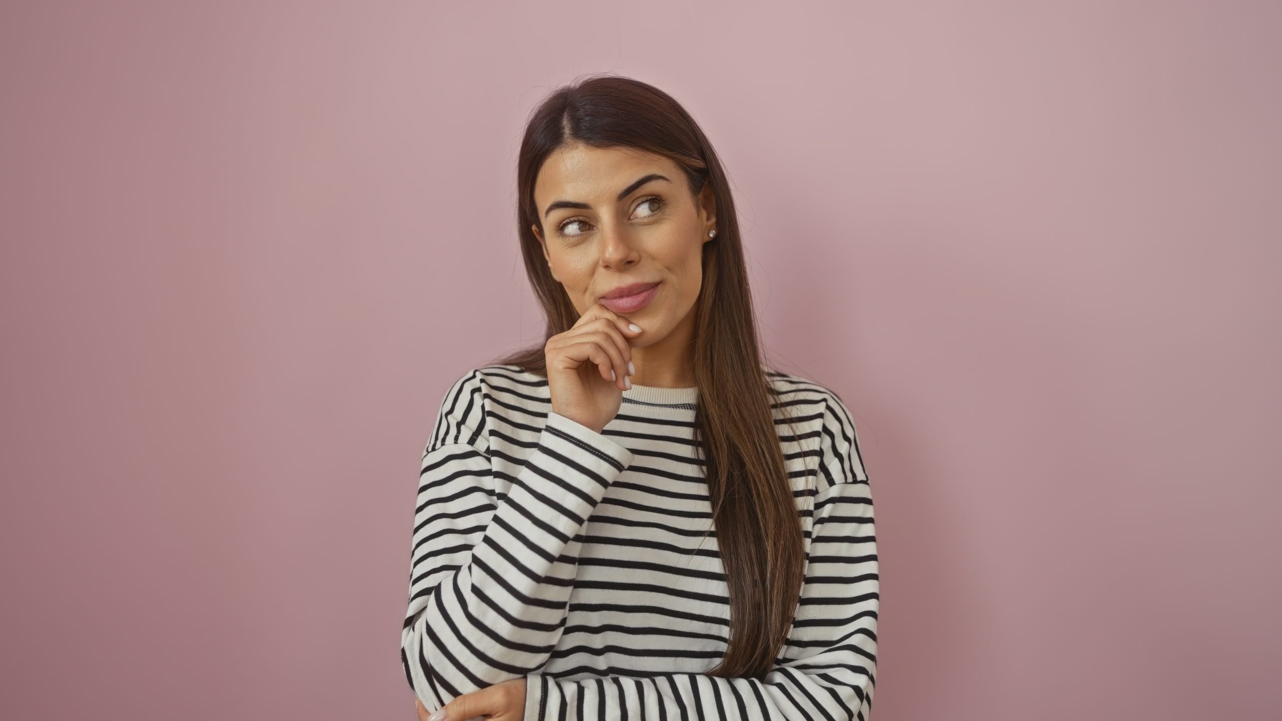 Thoughtful woman smiling