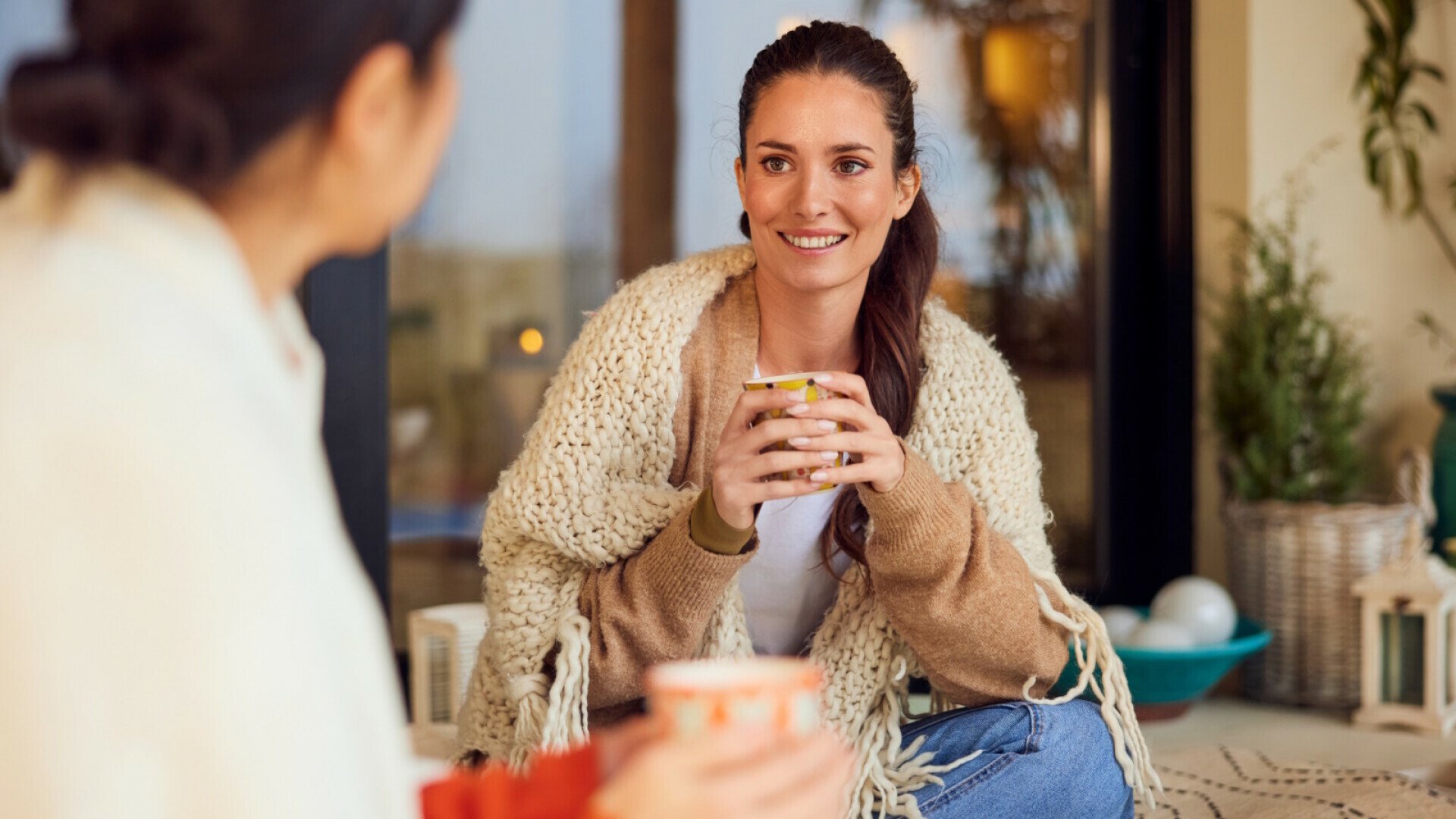 Warm friends talking
